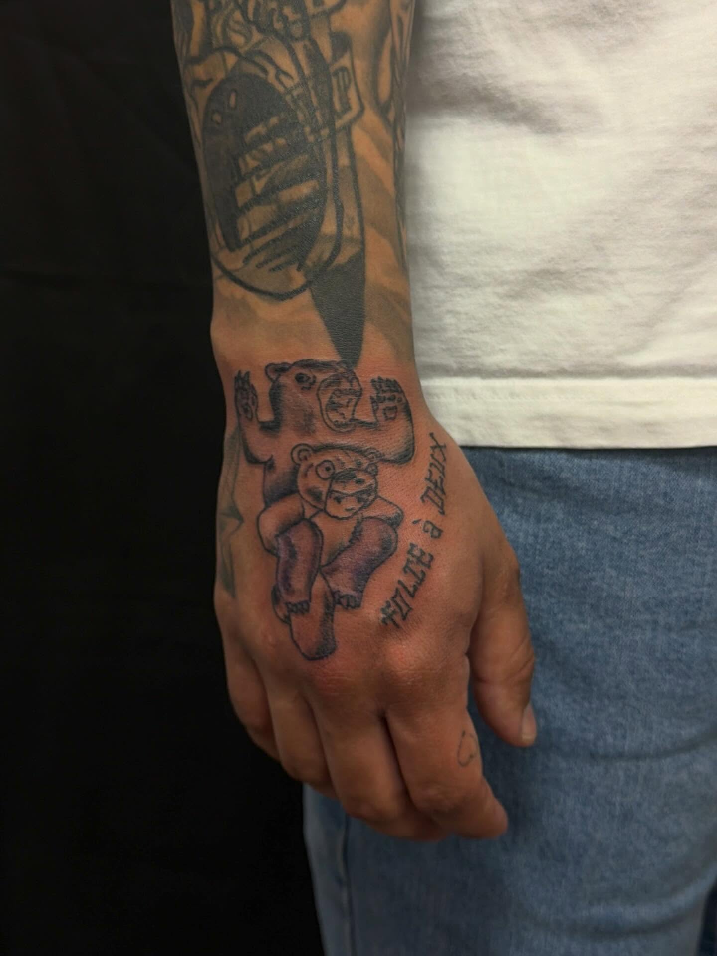 Bear and teddy bear black and grey tattoo on the forearm by cortez