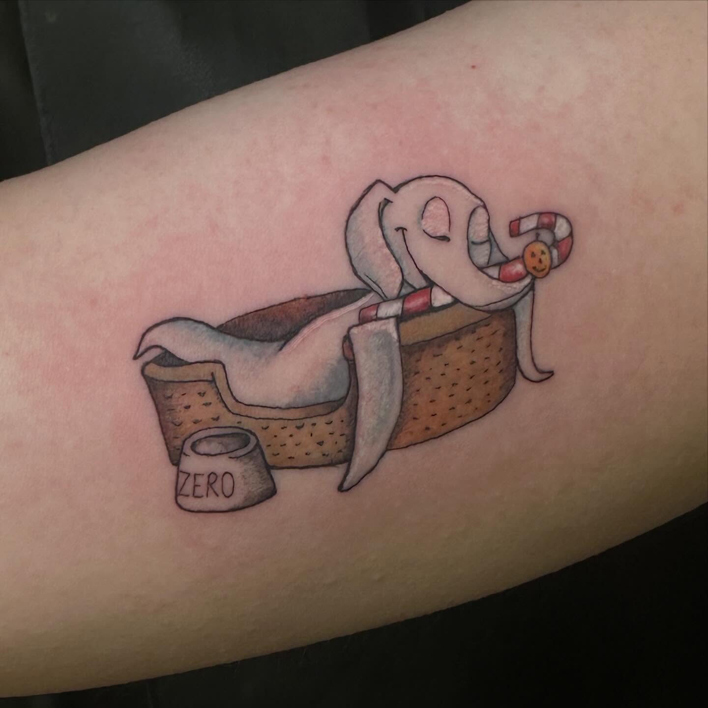 Elf in basket illustrative tattoo on the forearm by Sam, Mount Laurel, New Jersey