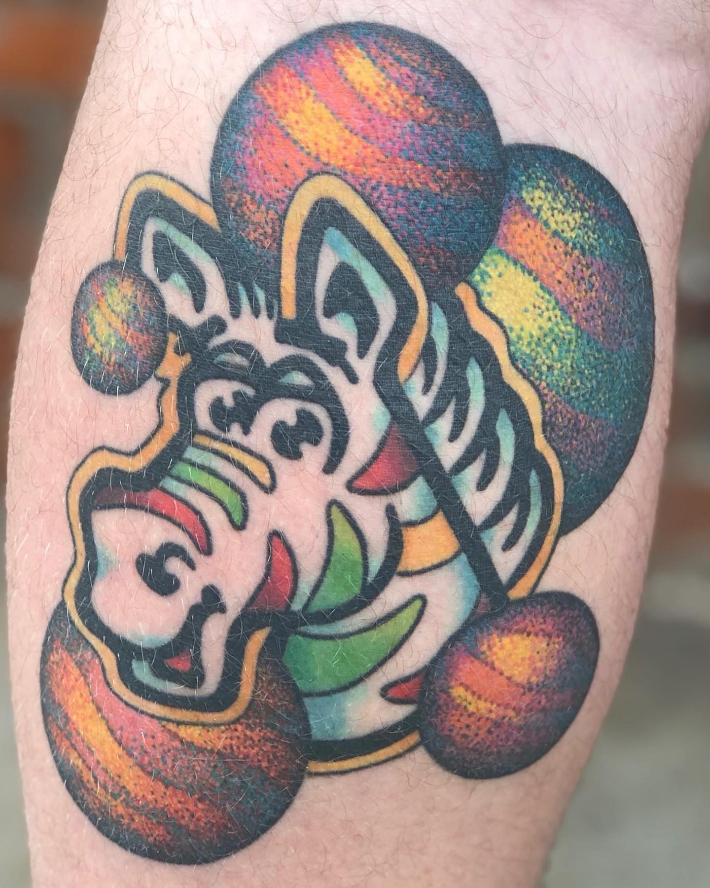 Clown face dotwork tattoo on the forearm by LiteBriteTattoo, Salt Lake City, Utah