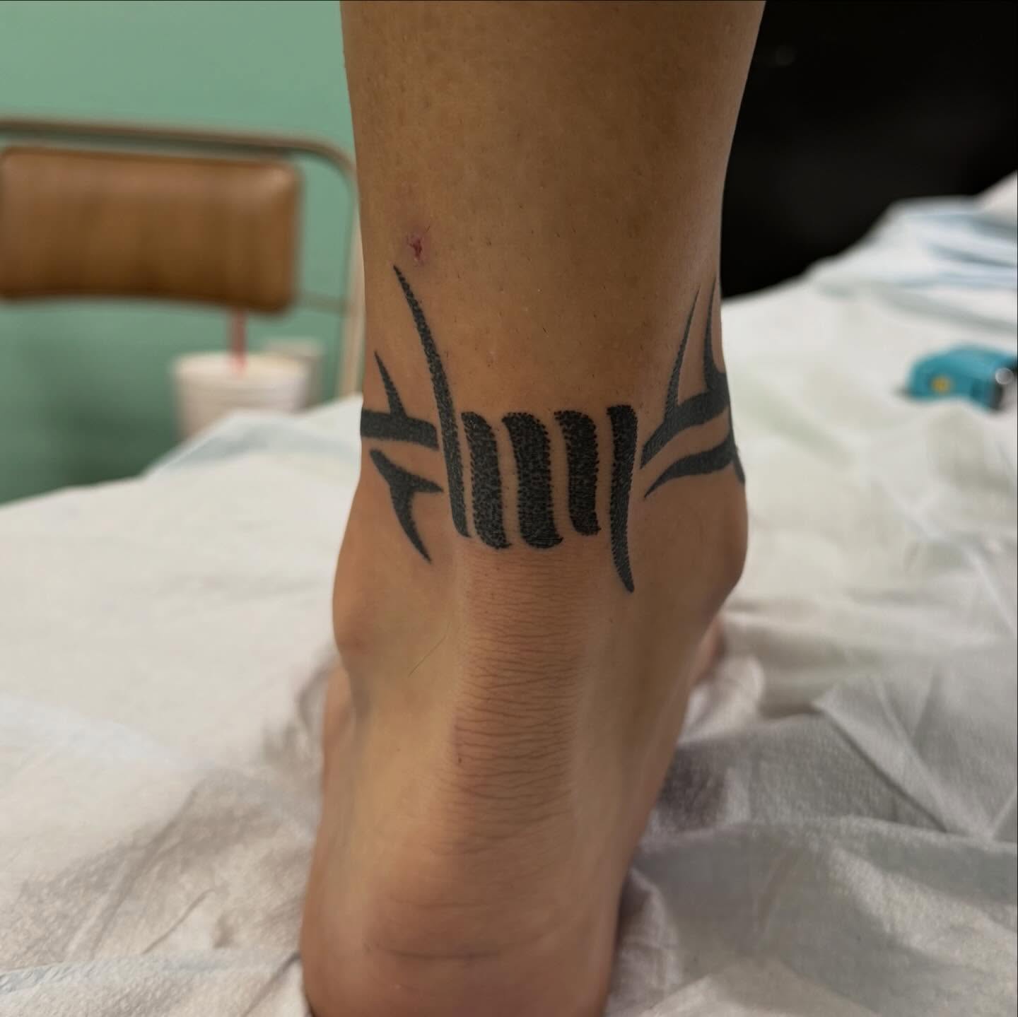 Tribal design tribal tattoo on the foot by Austin Tattoo Artist
