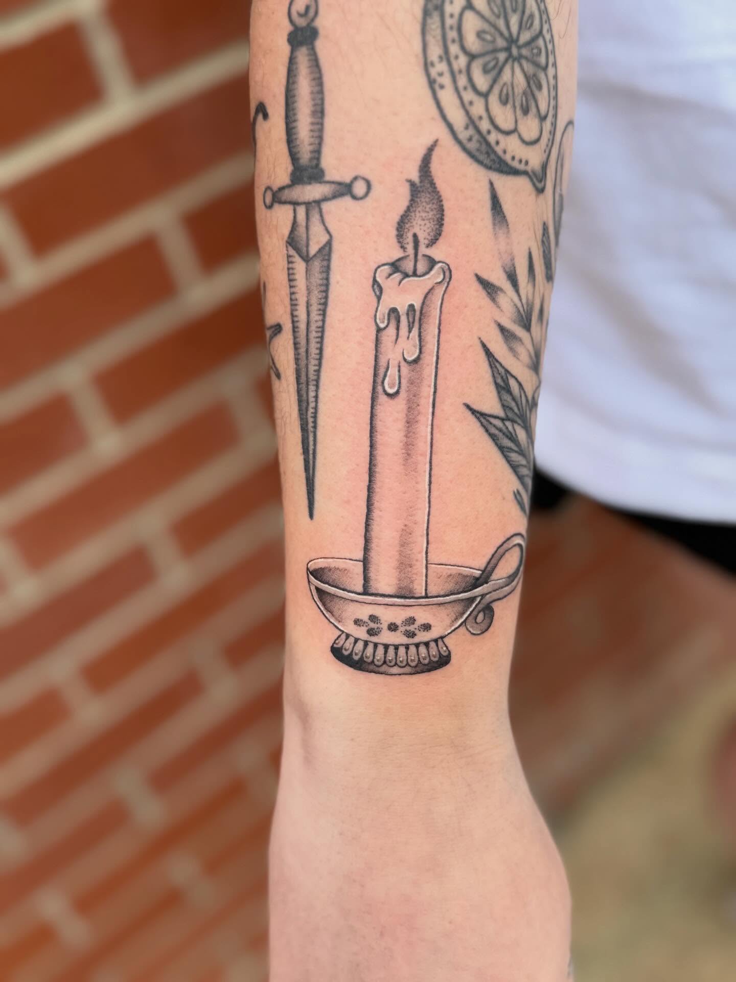 Candle black and grey tattoo on the forearm by Aly Rucker, Murfreesboro, Tennessee