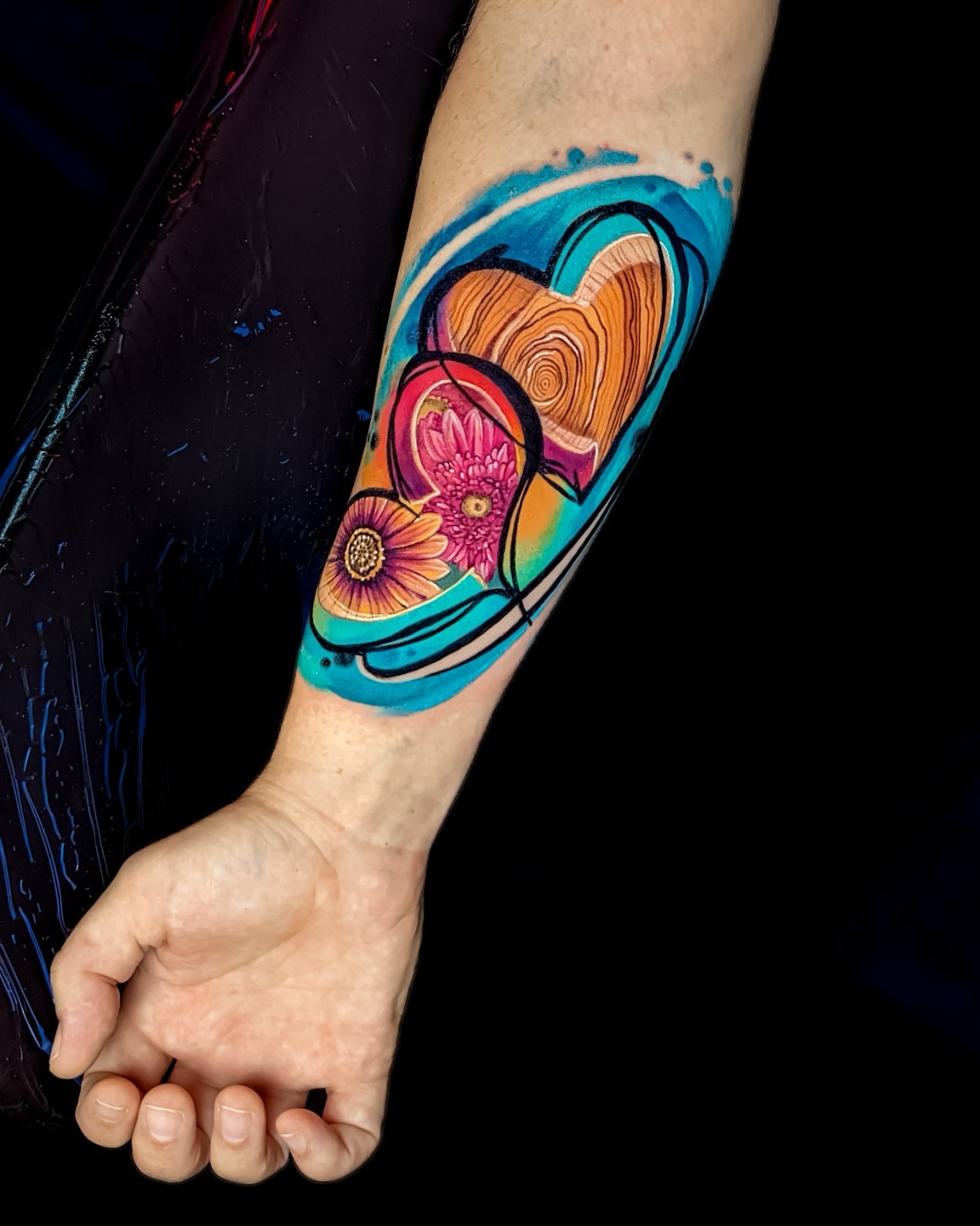 Heart with flowers new school tattoo on the forearm by Amy Zager