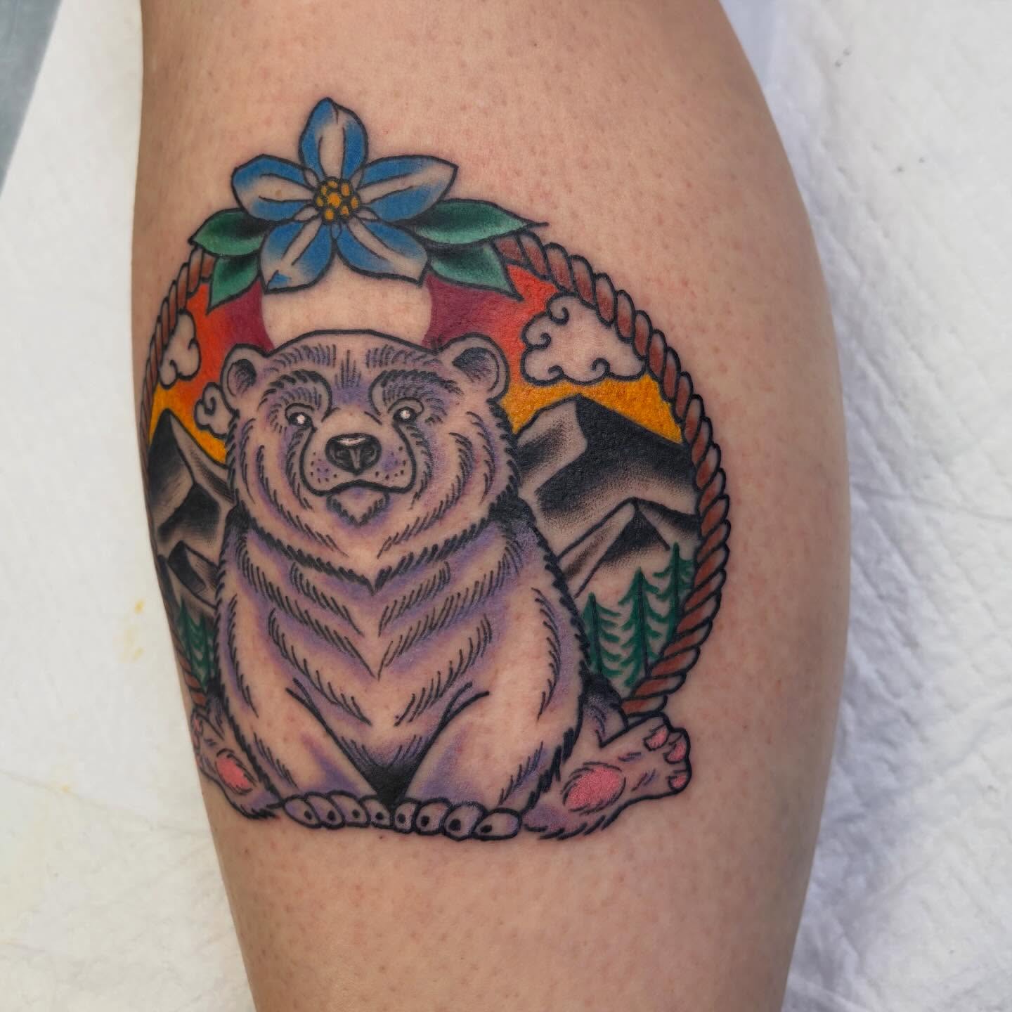 Bear American traditional tattoo on the thigh by Hailey Hermosillo
