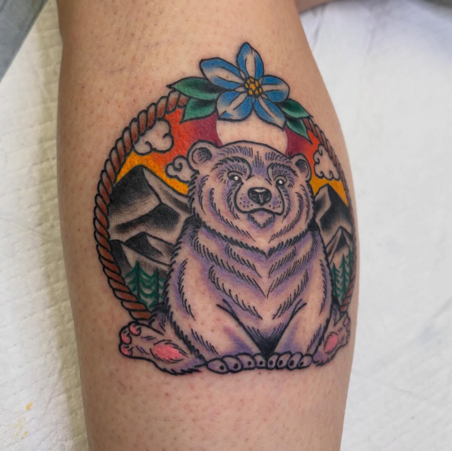 Bear American traditional tattoo on the forearm by Hailey Hermosillo