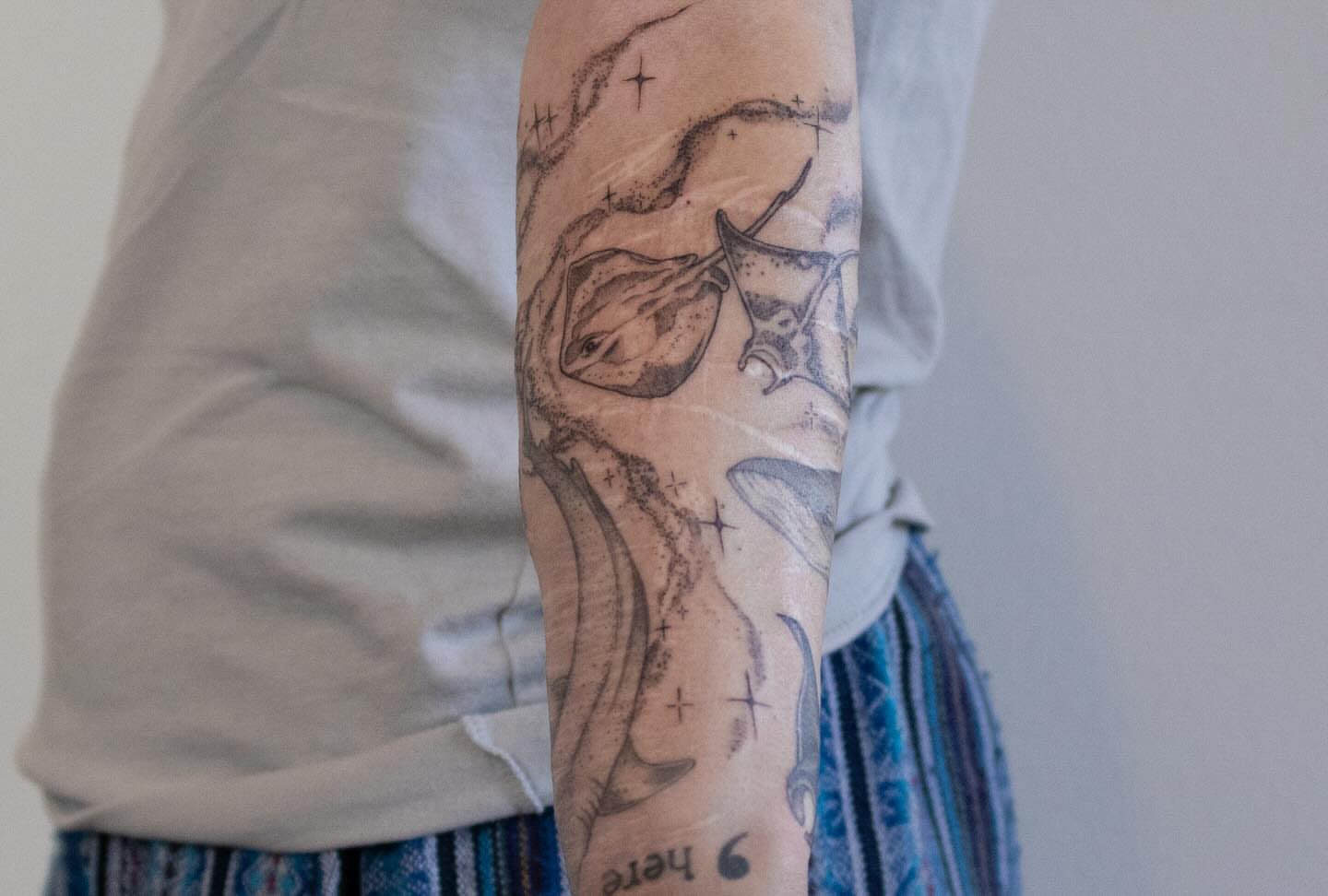 Abstract design dotwork tattoo on the forearm by Seraphim