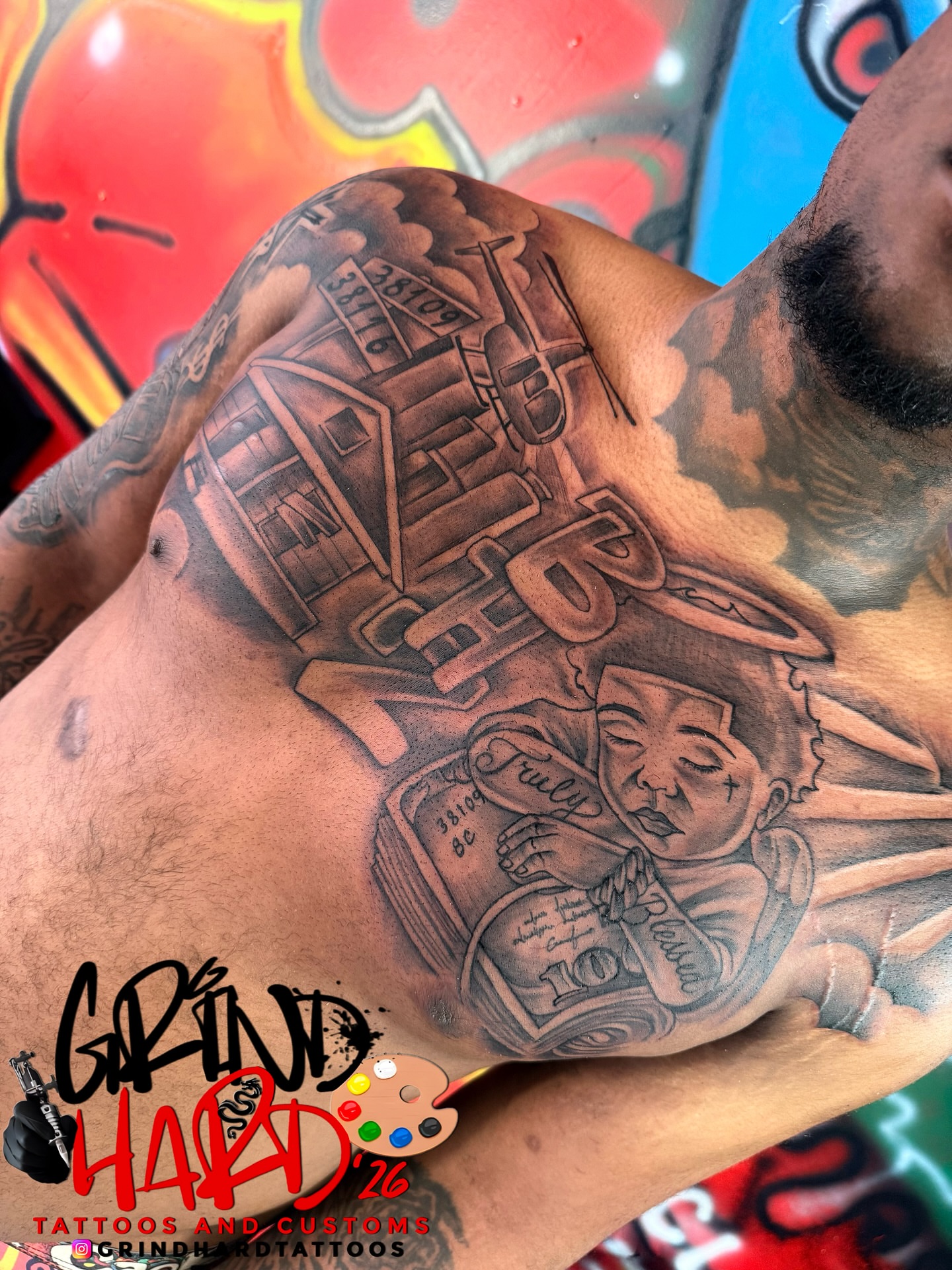 Truck and angel realism tattoo on the chest by GrindHard Quen