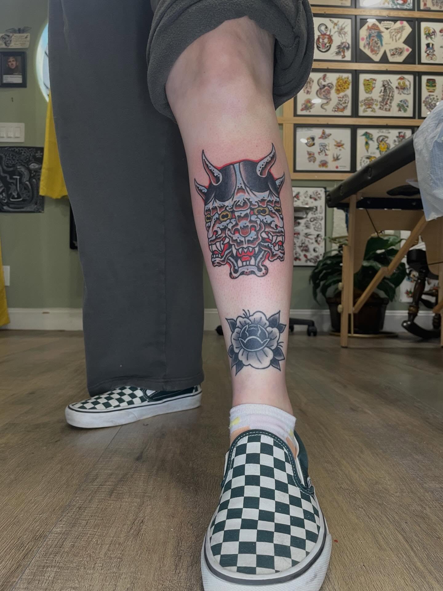 Demon skull American traditional tattoo on the calf by Nicholas M. Passeri