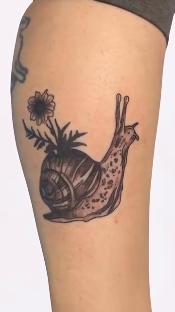Snail with flowers realism tattoo by Natalie Jade Shupe