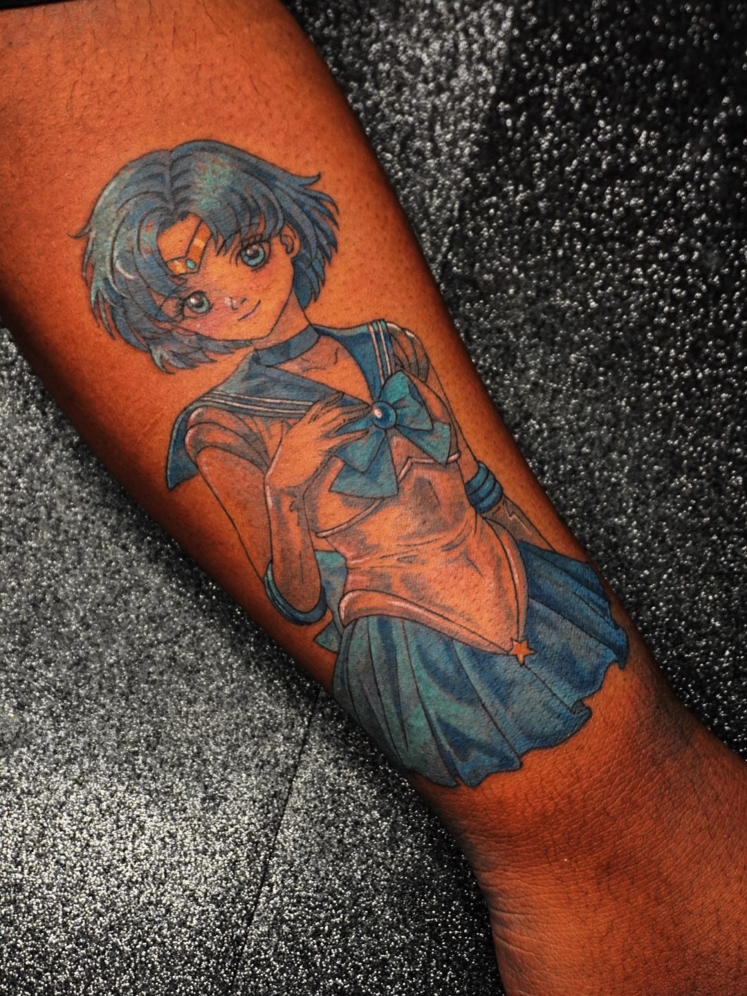 Anime character anime tattoo on the forearm by Ericka Hampton, Ferndale, Michigan