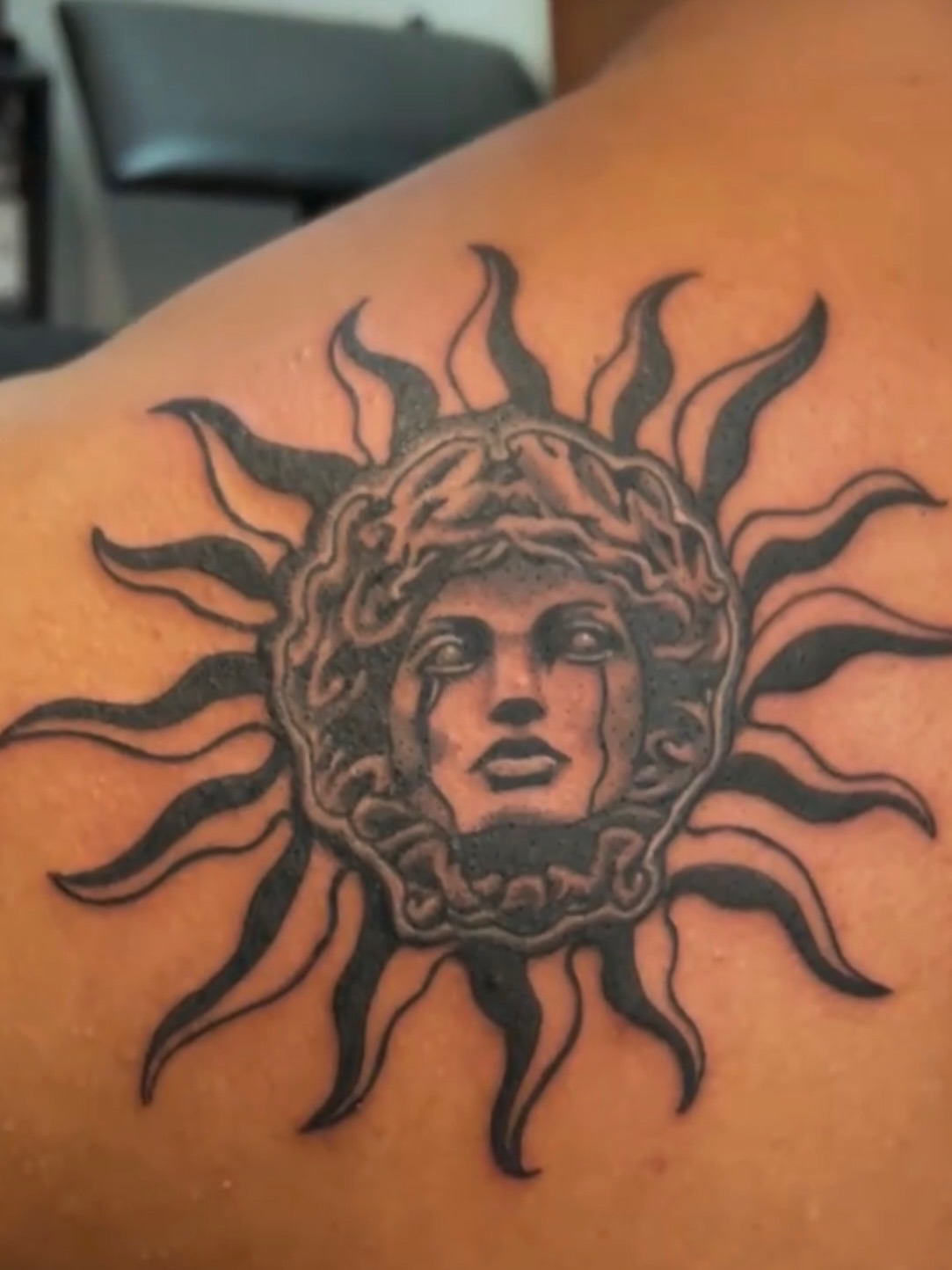 Medusa head black and grey tattoo on the shoulder by Erik Pagtakhan