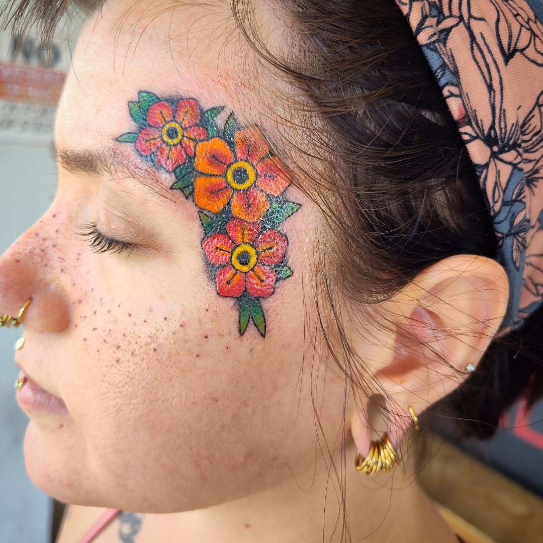Flowers dotwork tattoo on the head by Julie MacDonald