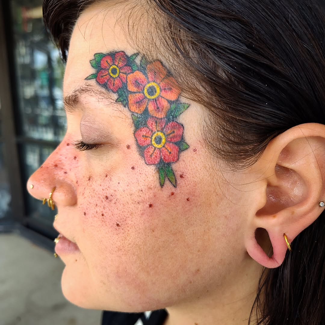 Flowers American traditional tattoo by Julie MacDonald