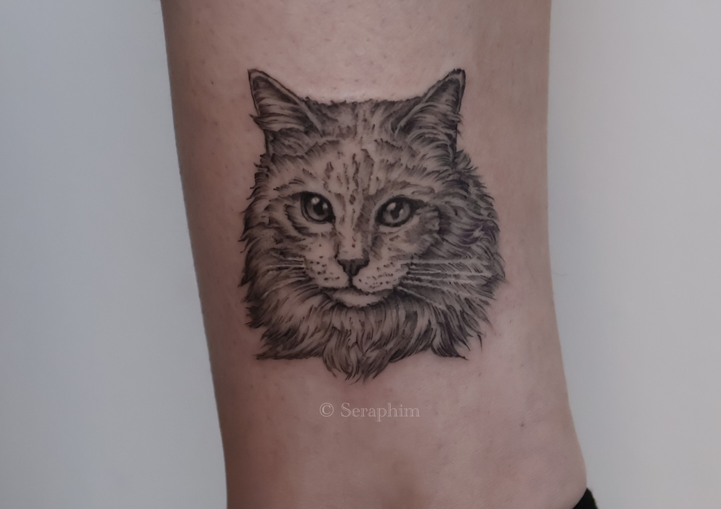 Tattoo by @seraphim.fineline — realism