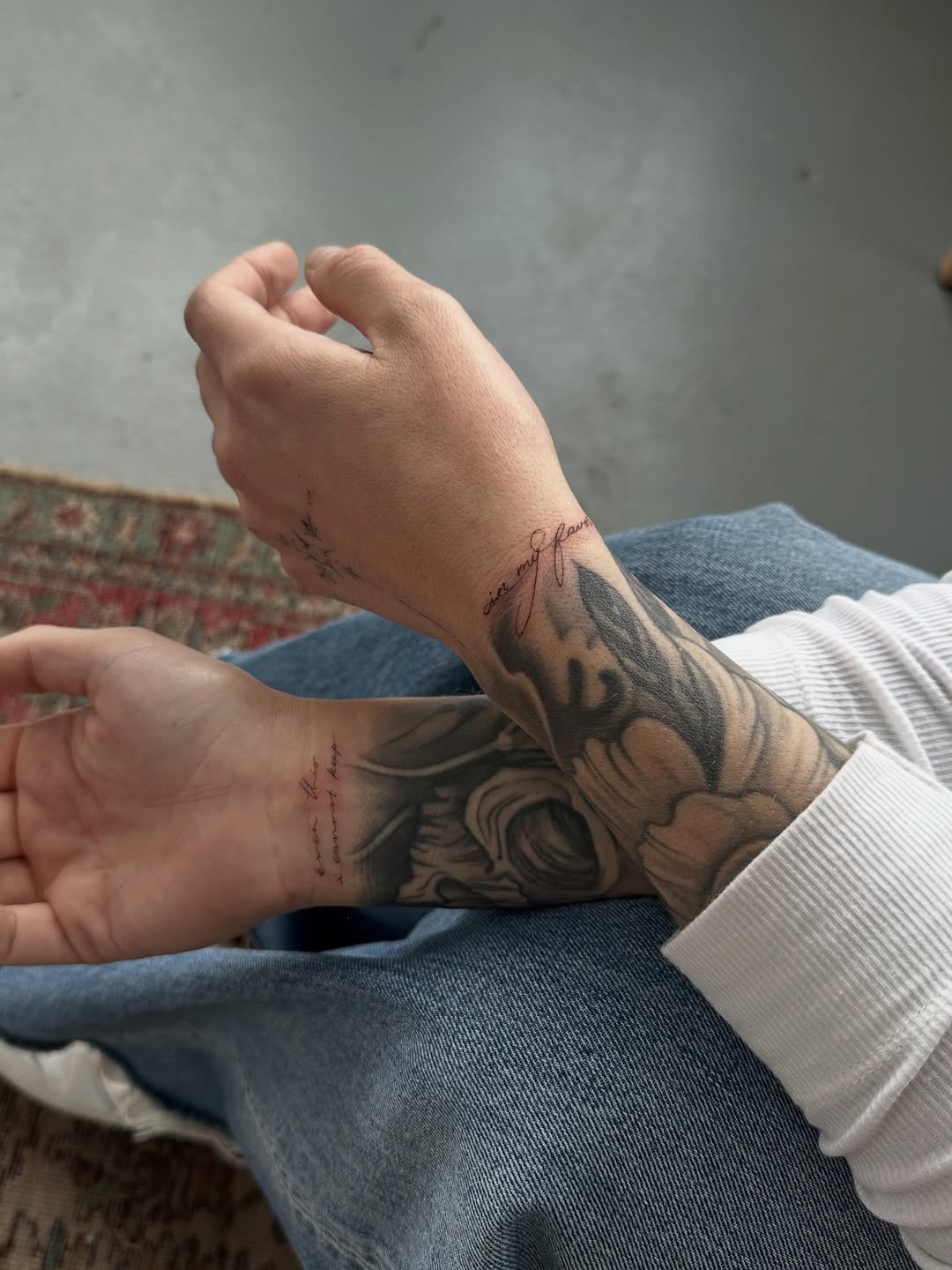 Script lettering on wrist lettering tattoo on the forearm by @taravychi