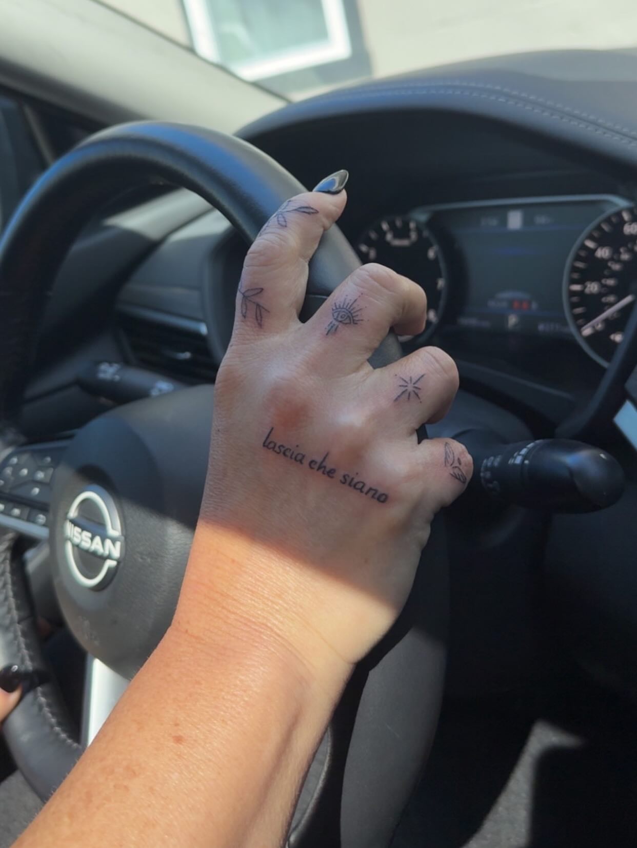 Eye fine line tattoo on the hand by Lexie Decker, Canton, Ohio