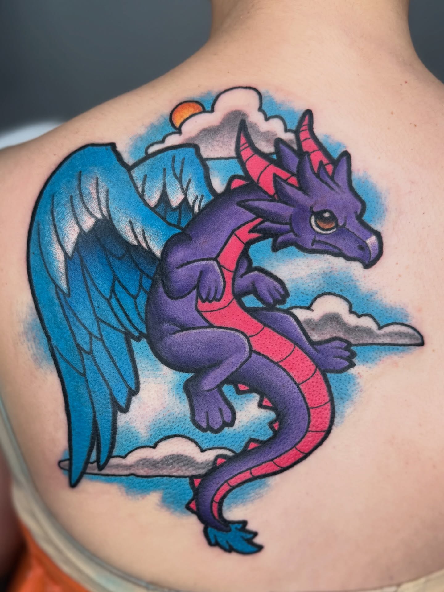 Purple dragon American traditional tattoo on the back by T Dubs ✏️