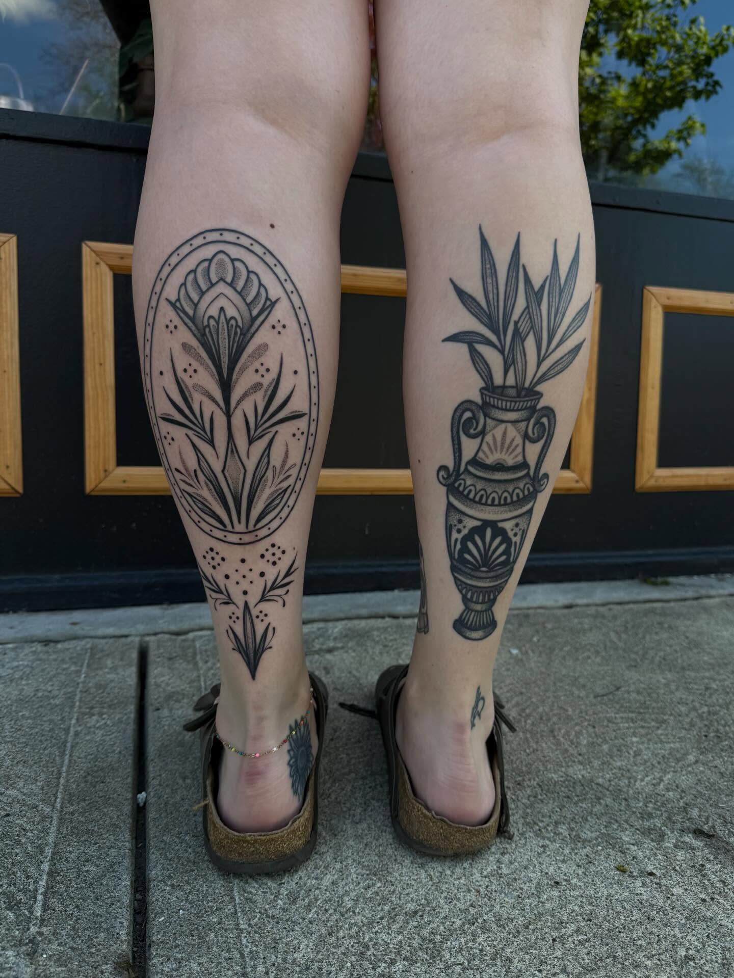 Floral arrangement black and grey tattoo on the calf by Allison