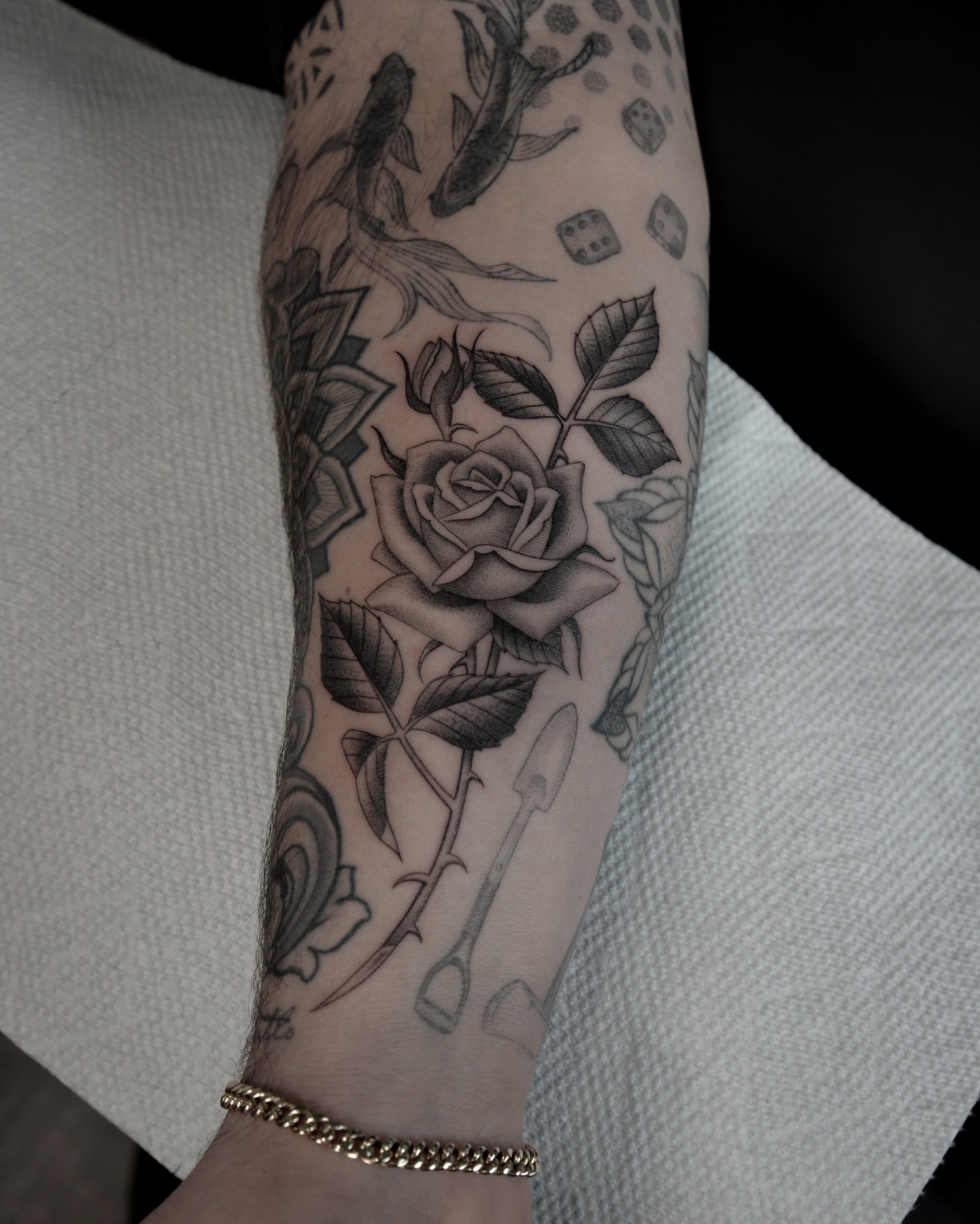 Rose black and grey tattoo on the forearm by zak brochu, Windsor, Ontario