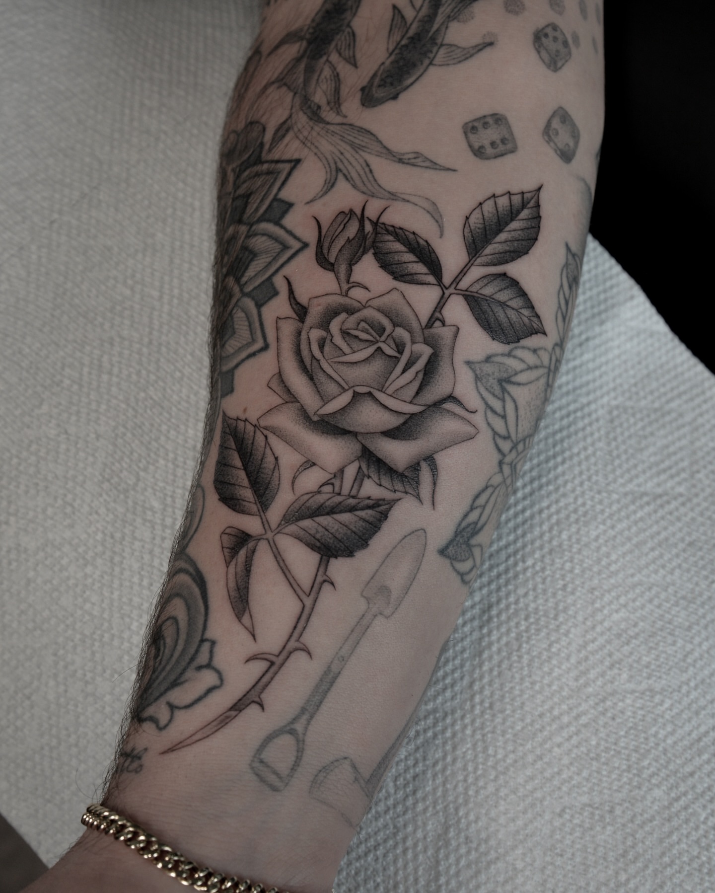 Rose American traditional tattoo on the forearm by zak brochu, Windsor, Ontario
