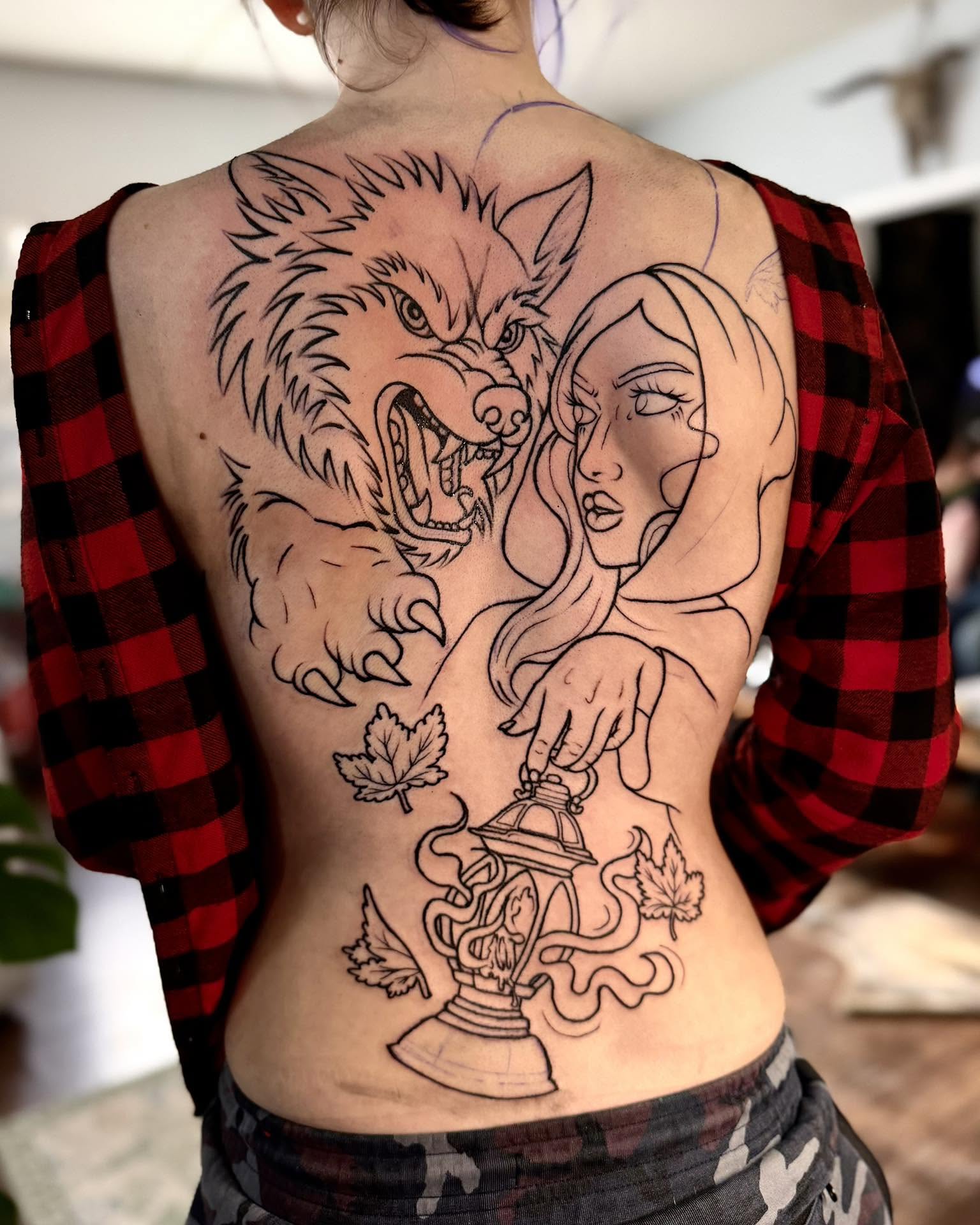 Woman and wolf realism tattoo on the back by Eden Rose, Kalama, Washington