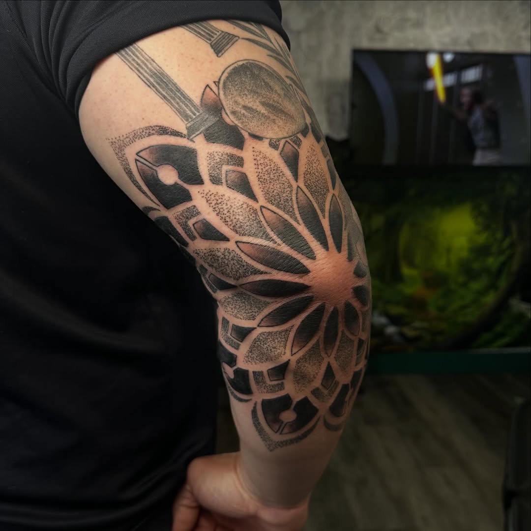 Tattoo by @madfrogs.tattooz β geometric, dotwork