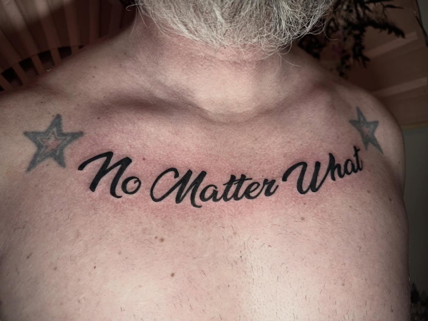 No Matter What lettering script tattoo on the chest by abbie michelle