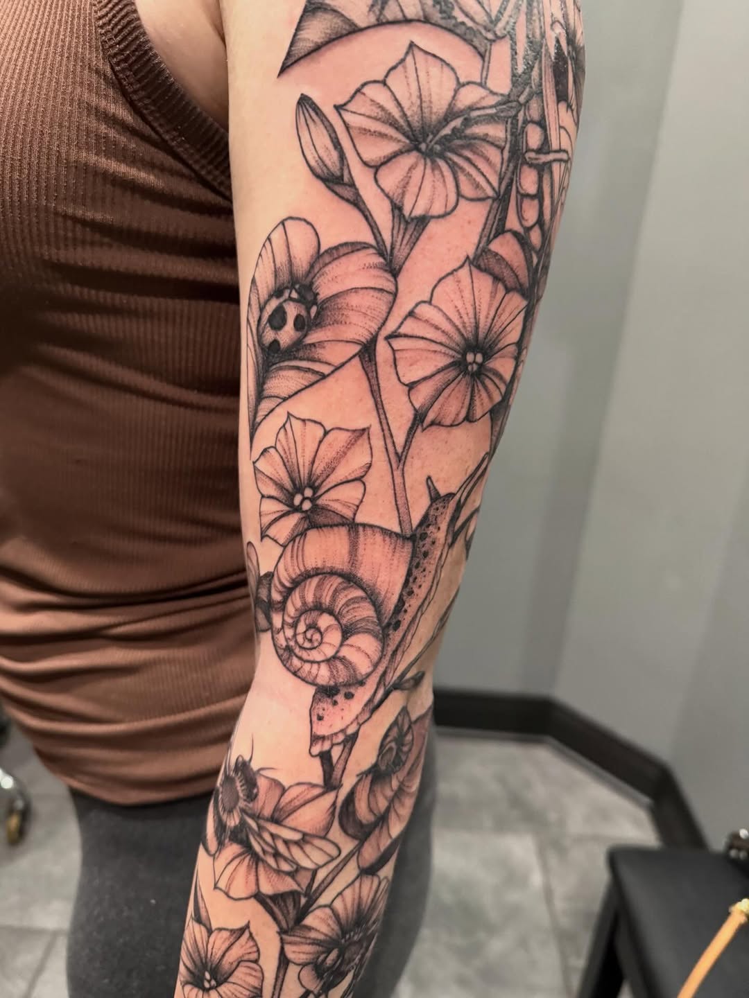 Tattoo by @blackhartdesigns — black_and_grey, realism