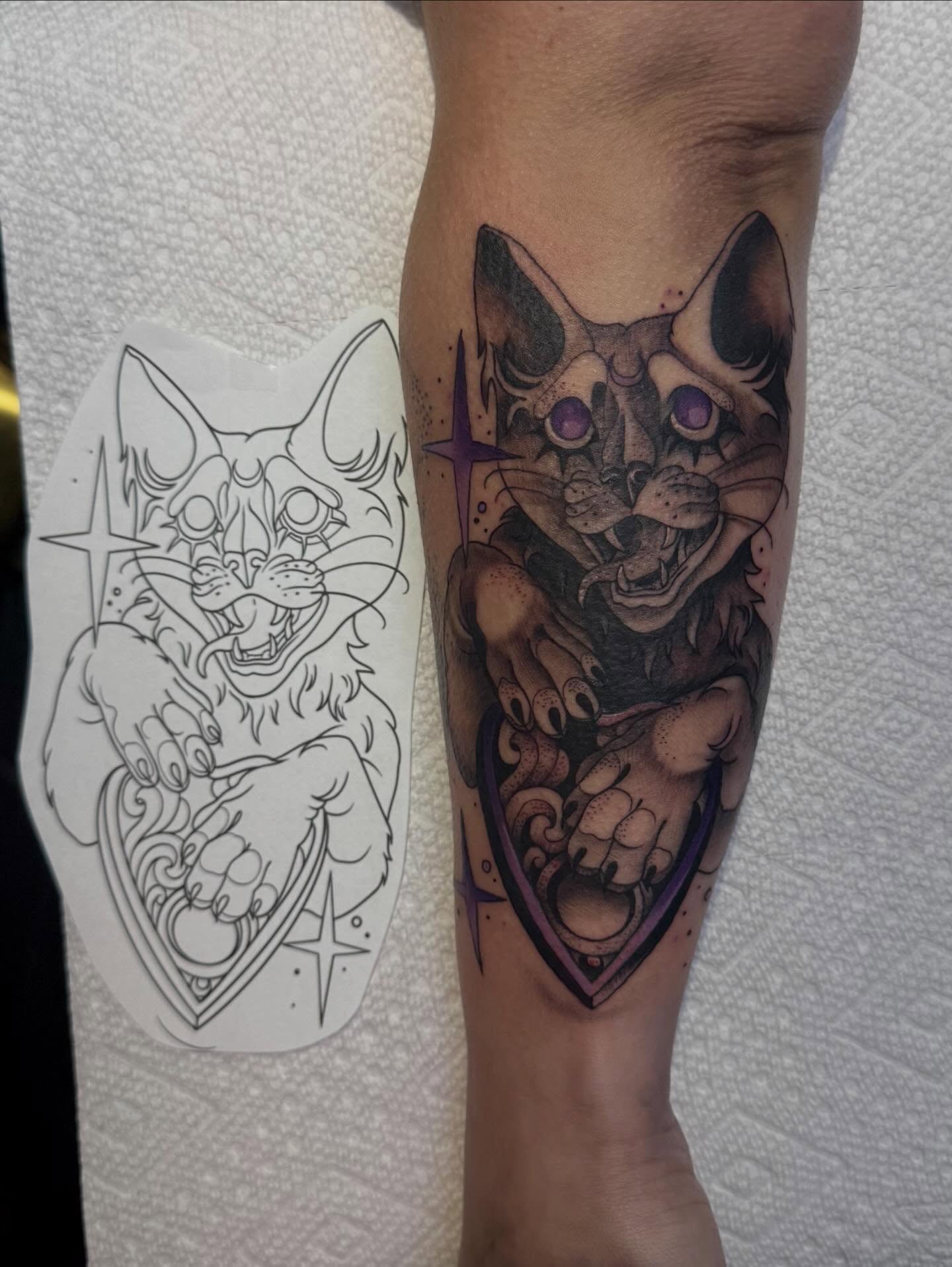 Cat American traditional tattoo on the forearm by Kalina Lynn