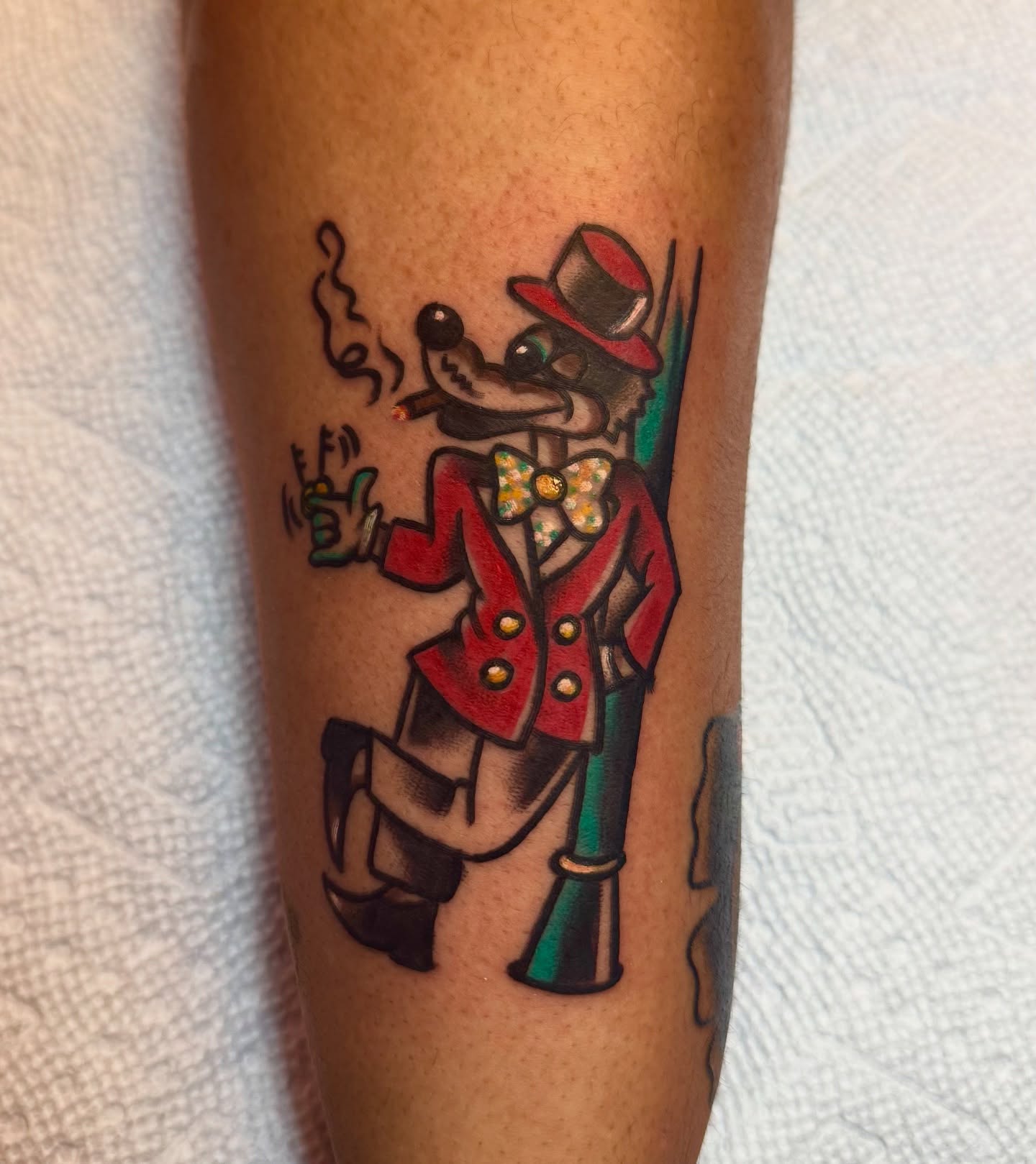 Fox in suit American traditional tattoo on the forearm by Brandon
