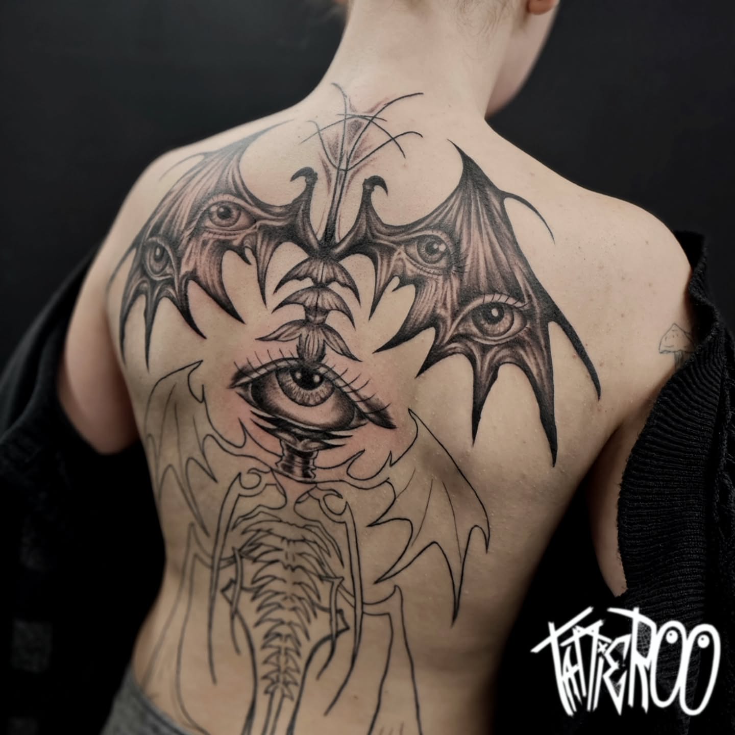Tattoo by @tattier00 — black_and_grey, realism
