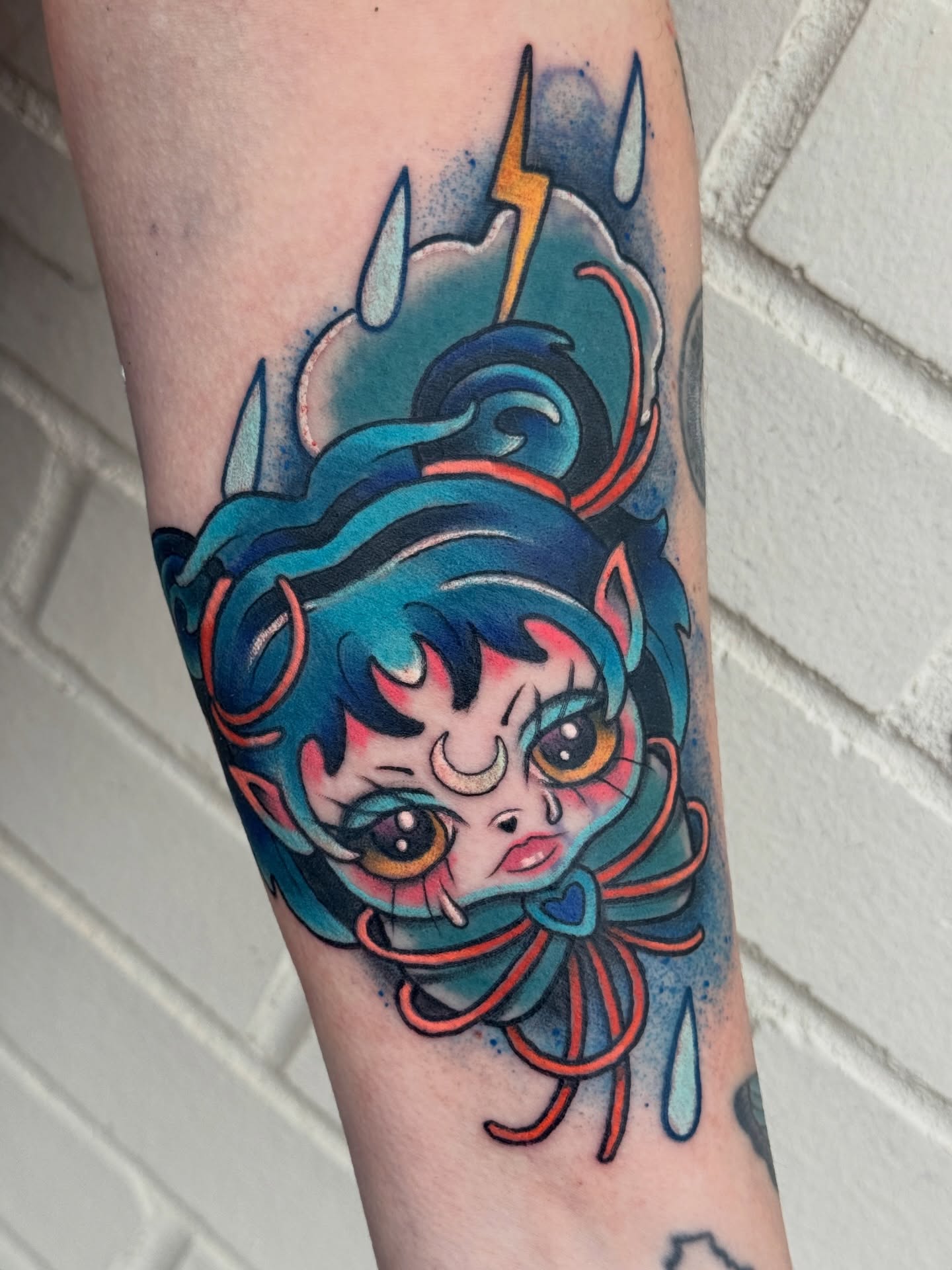 Anime-style character anime tattoo on the forearm by Tattoos by Angel Lee