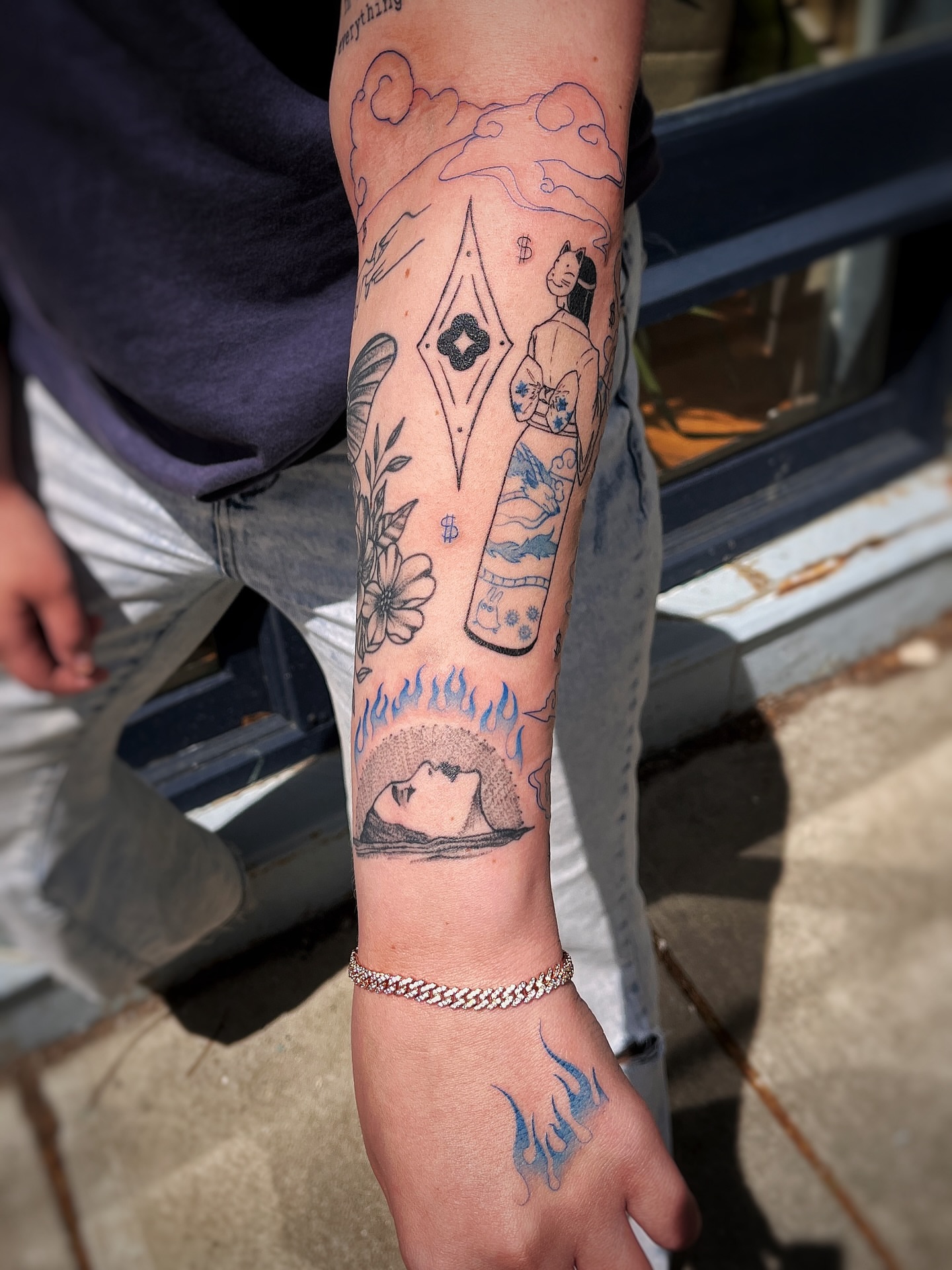 Abstract surrealism surrealism tattoo on the forearm by Risa Cincinnati Tattoo Artist