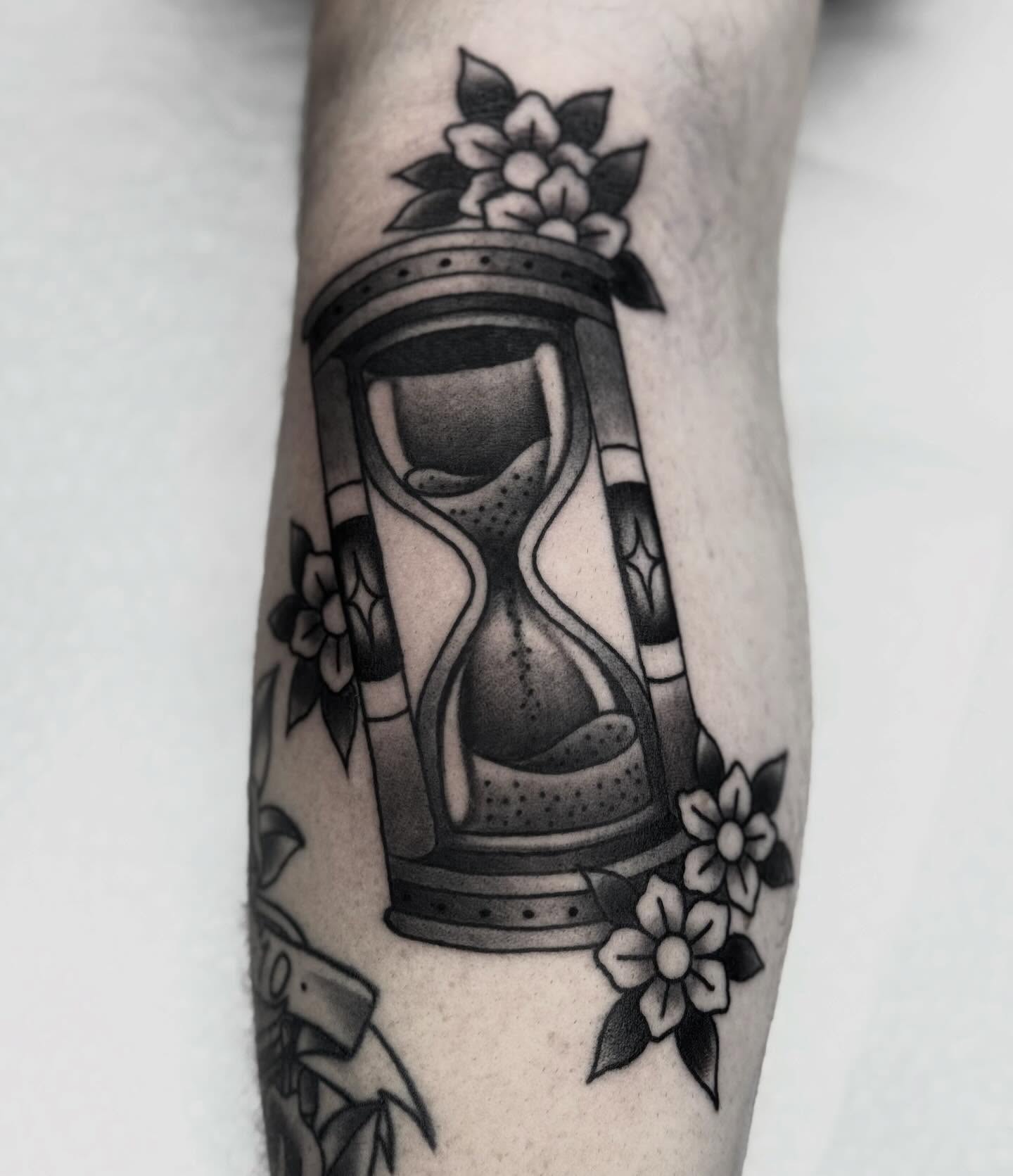 Hourglass black and grey tattoo on the forearm by Domanick Libretti, Nashville, Tennessee