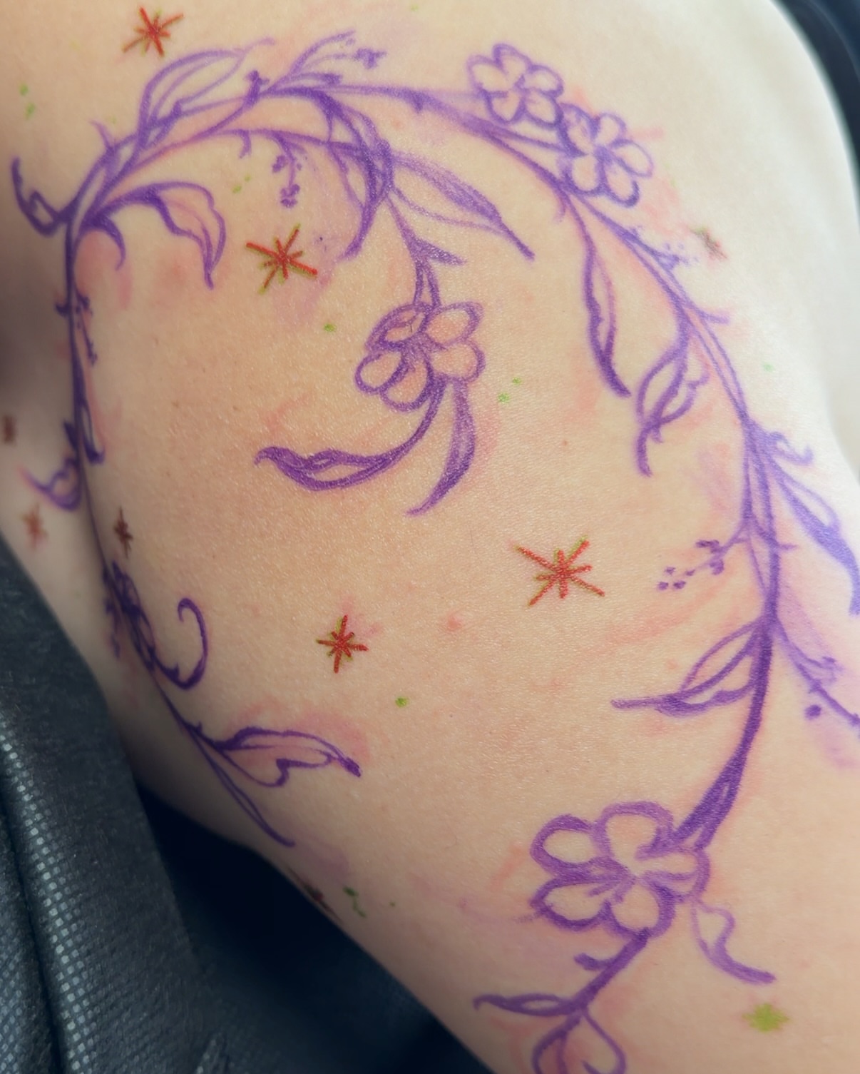 Cherry blossoms watercolor tattoo on the forearm by Sab