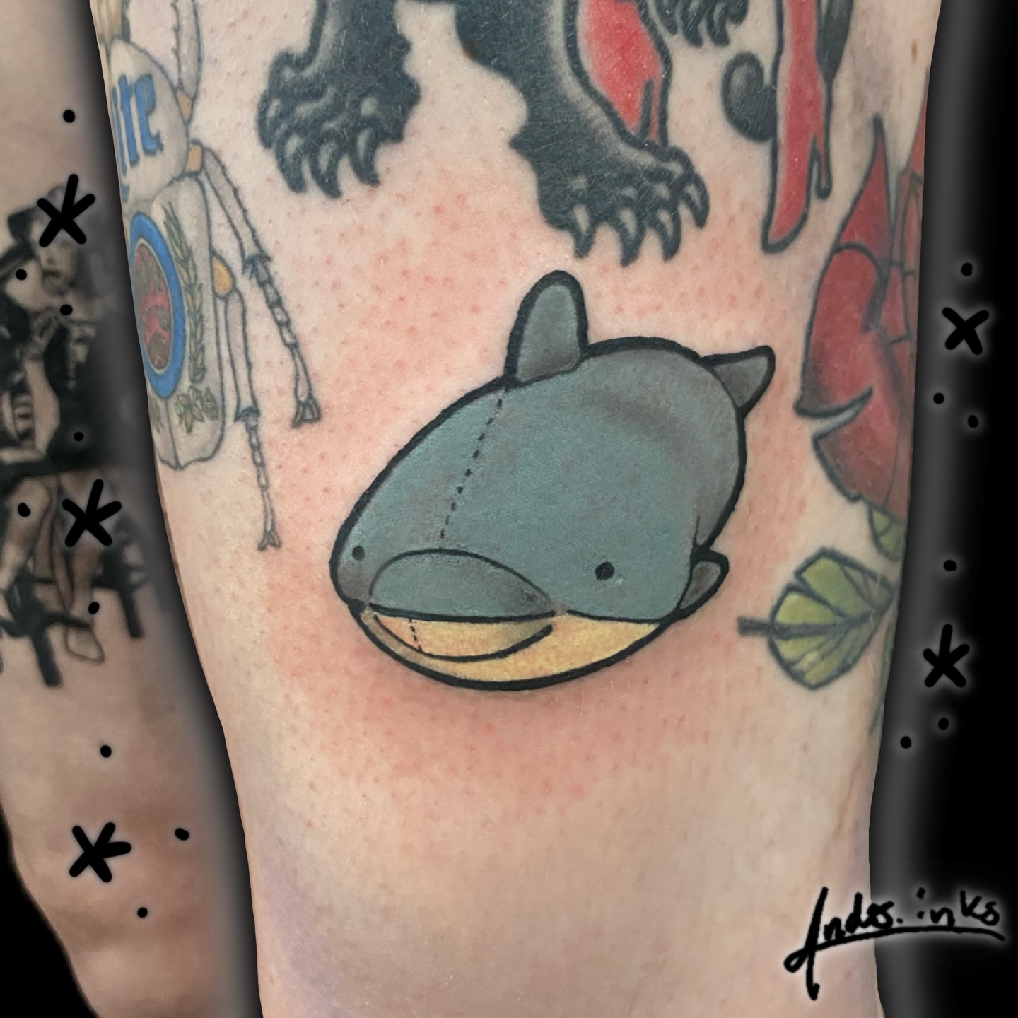 Whale new school tattoo on the forearm by ande