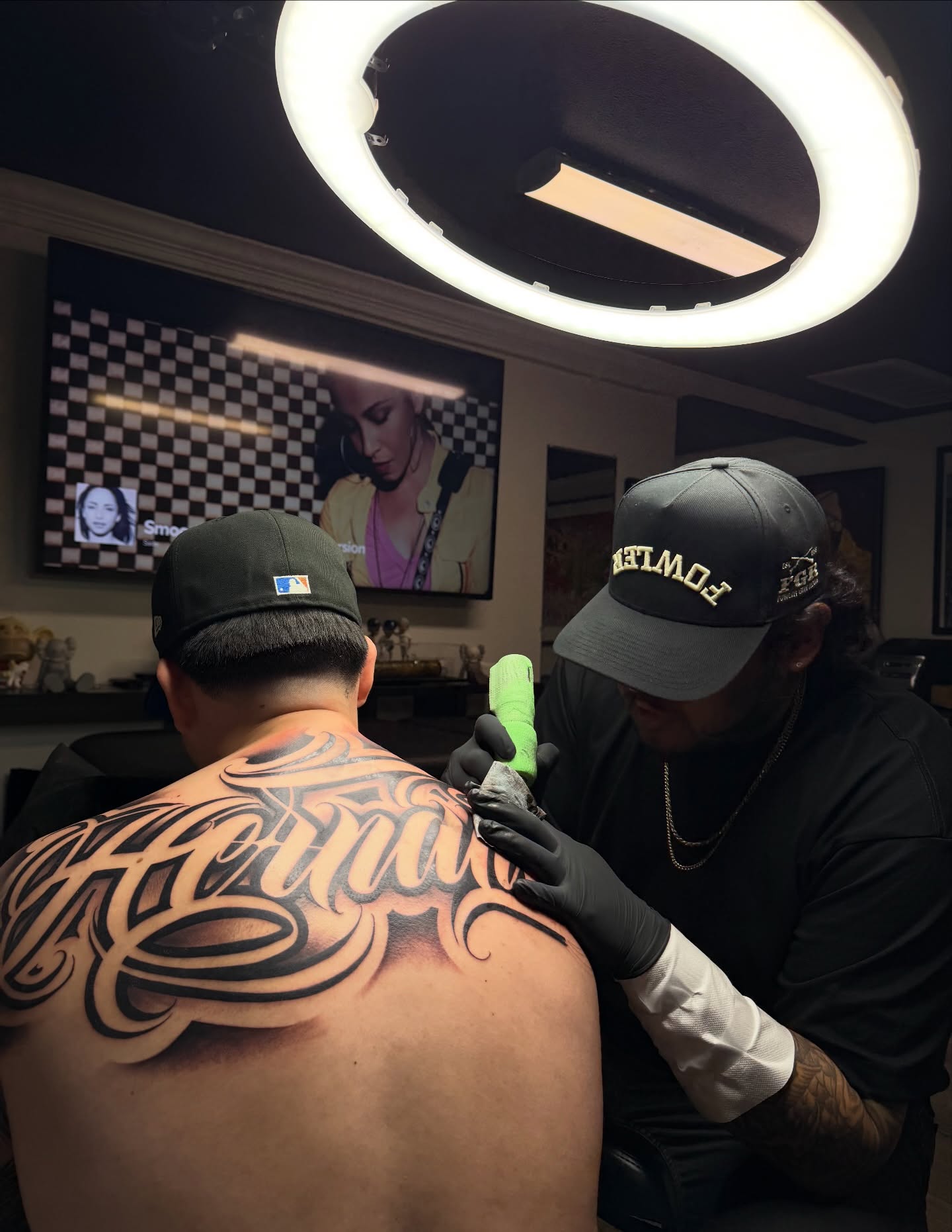 Script lettering lettering script tattoo on the back by Rocky G Inkz LLC