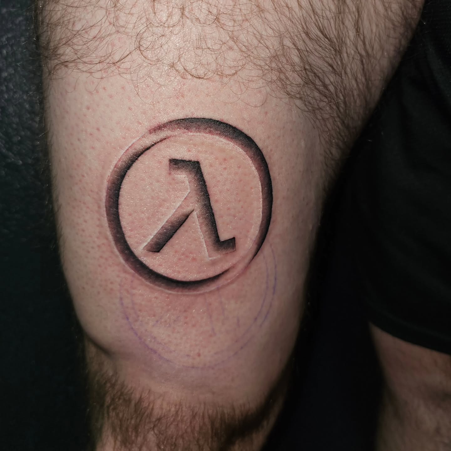 Half-Life Lambda symbol black and grey tattoo on the forearm by Ari 💠🧜‍♂️🐟🎨🦑🐚💠