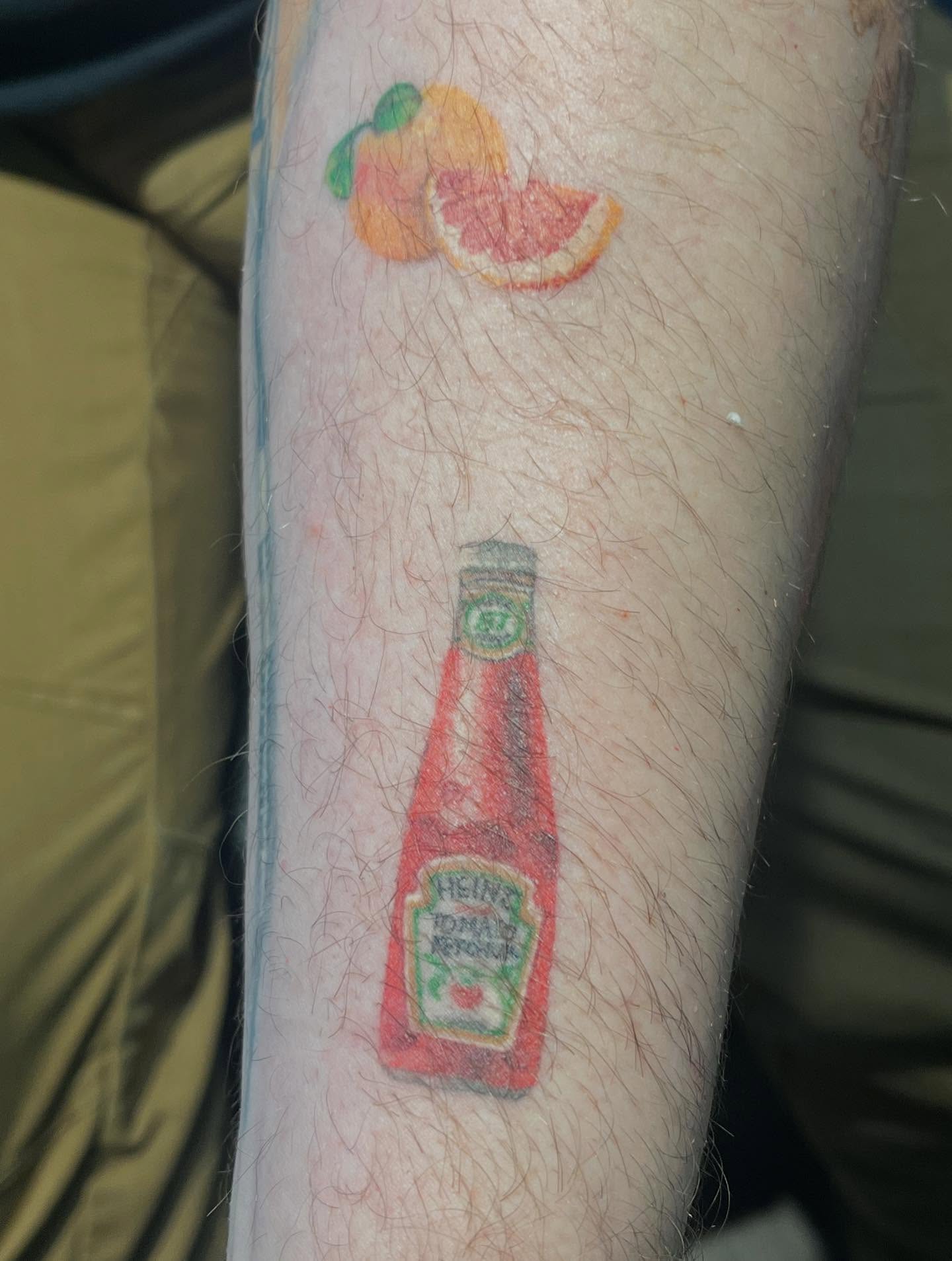 Heinz ketchup bottle realism tattoo on the forearm by 🖤Jess Pereira🖤, Framingham, Massachusetts