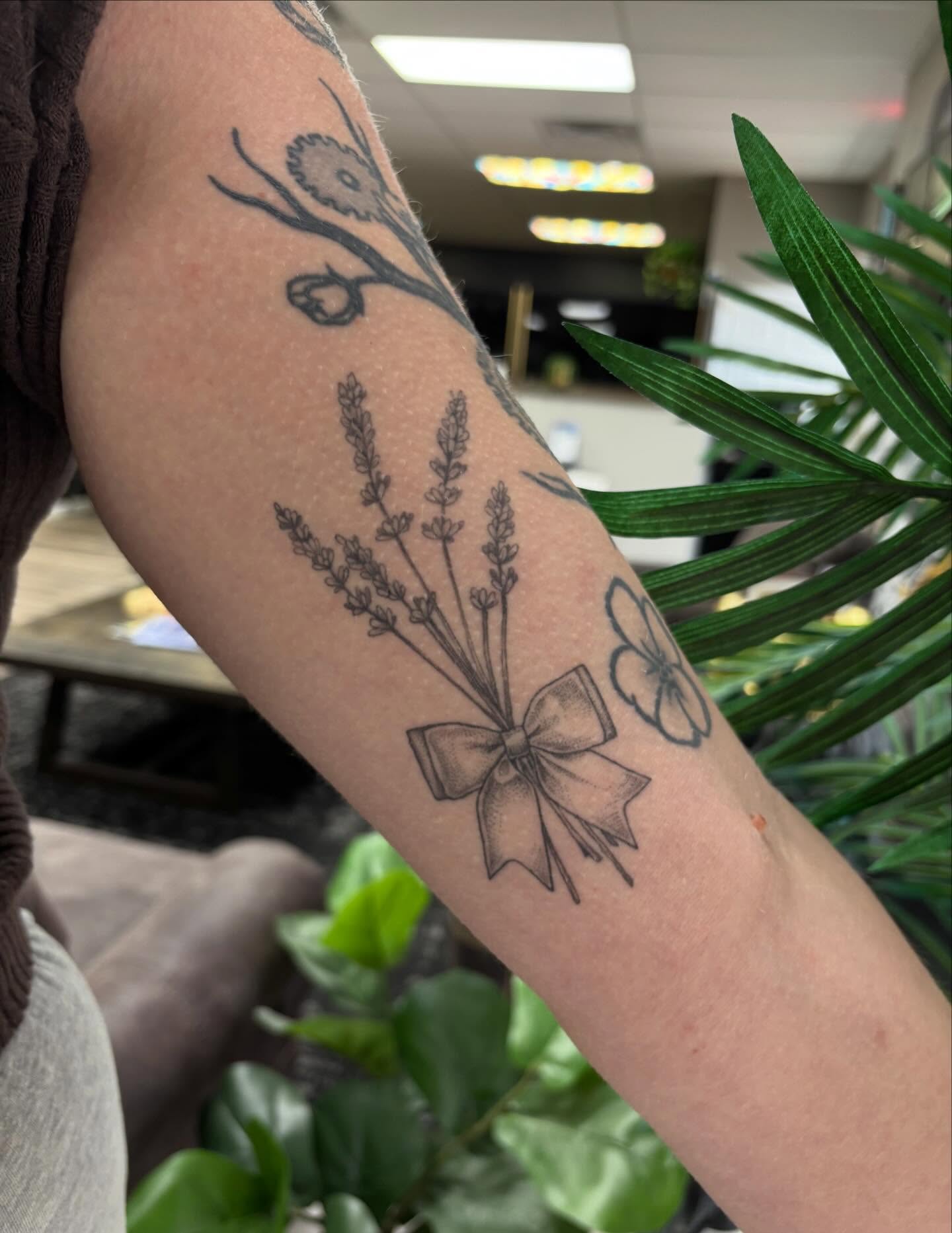 Lavender bouquet black and grey tattoo on the forearm by Hailey Nicole