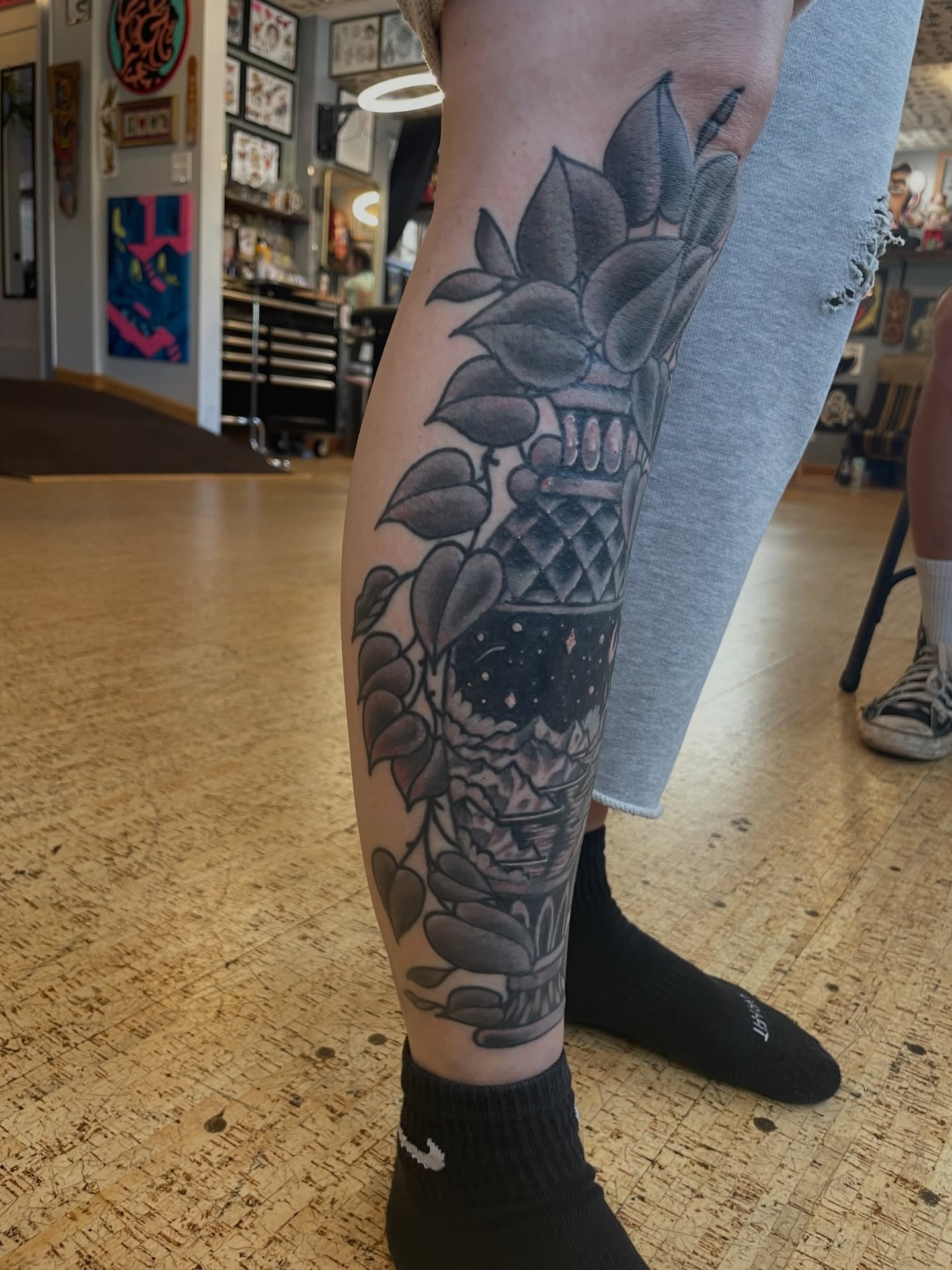 Pineapple skull realism tattoo on the calf by Kimber Teatro, Portland, Oregon