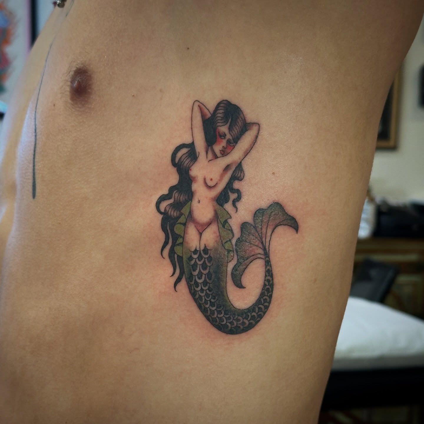Mermaid American traditional tattoo on the thigh by Bree Lin