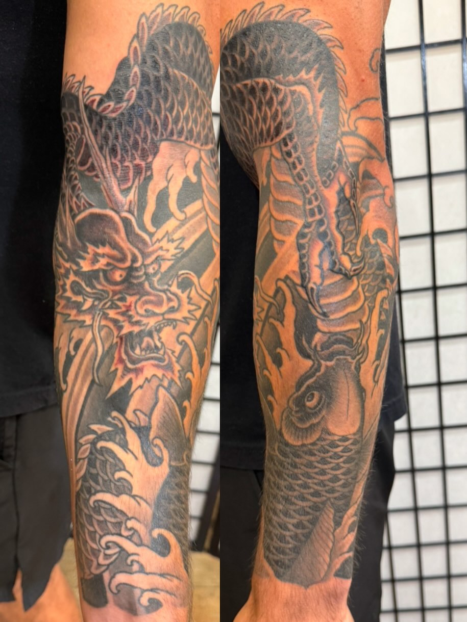 Dragon and koi fish japanese irezumi tattoo on the forearm by Jeremy Justice, New Orleans, Louisiana