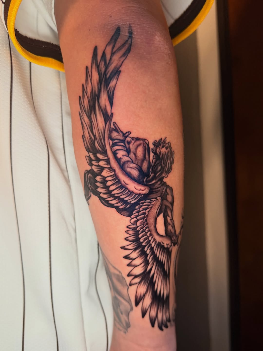 Angel with wings realism tattoo on the forearm by jayla pantig