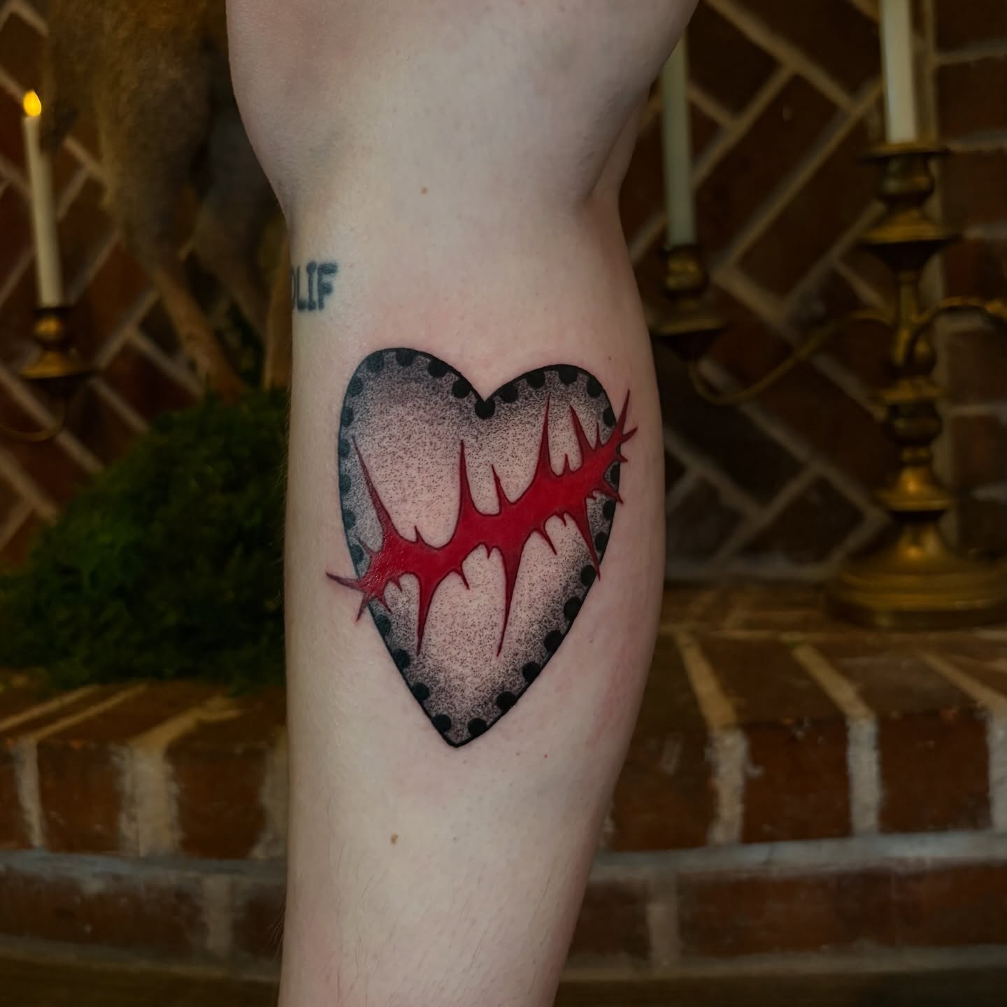 Heart with spiky edges dotwork tattoo on the forearm by ✠ courtney jorée ✠