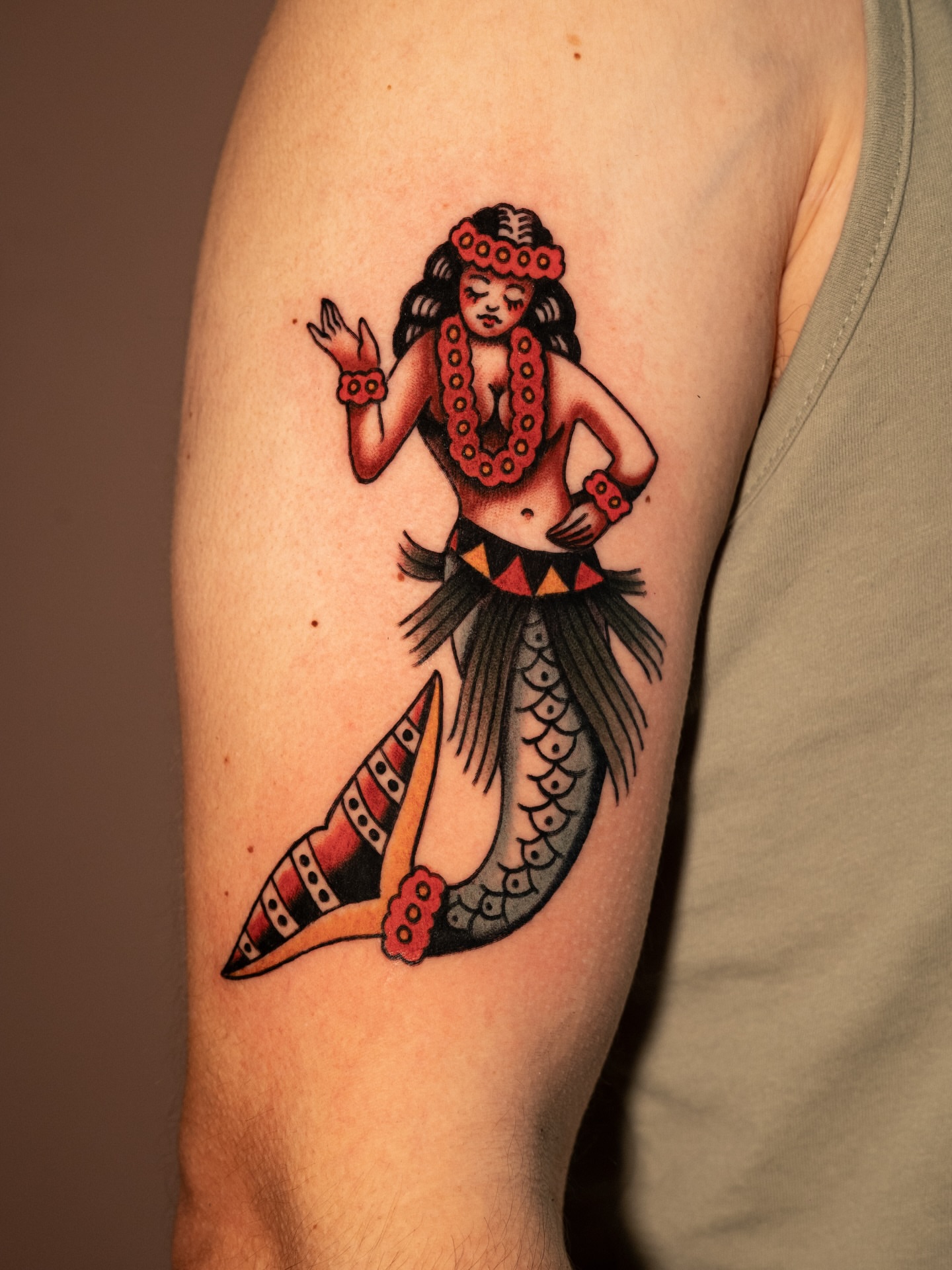 Mermaid American traditional tattoo on the forearm by Dylan Mott