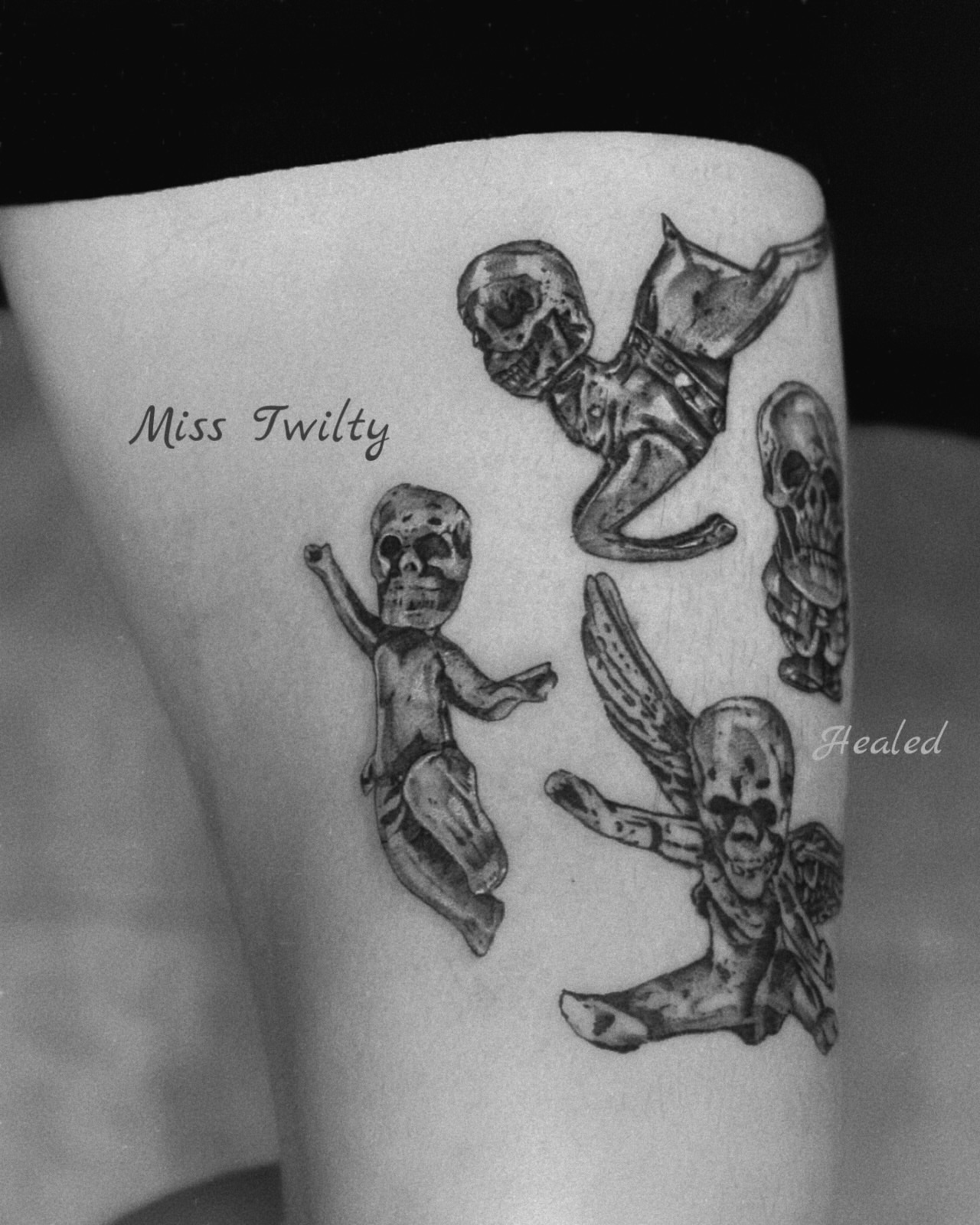 Skulls black and grey tattoo on the forearm by MJ