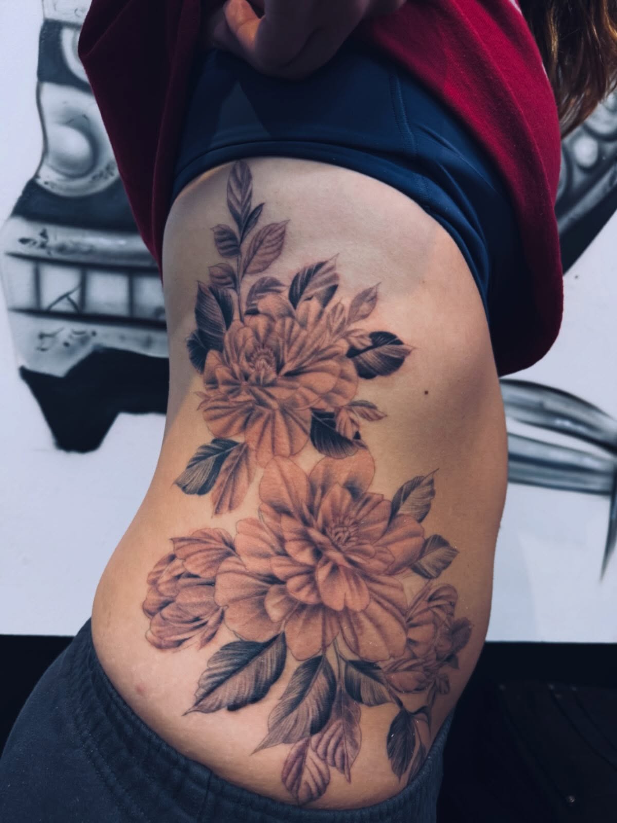 Floral bouquet realism tattoo on the ribs by πΎππππππππ