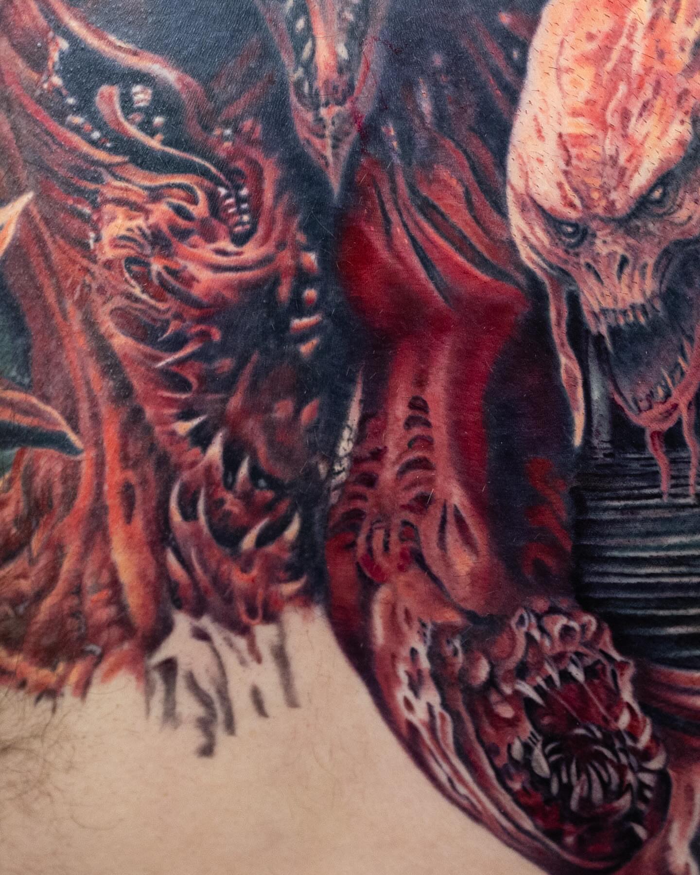 Demon heads dark realism tattoo on the chest by Realistic tattoos in Minneapolis, MN, Minneapolis, Minnesota