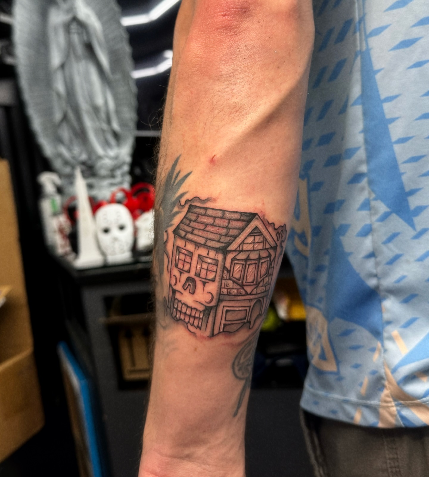 House with skull black and grey tattoo on the forearm by 🕸️EC🥷🏼🌁🇲🇽🕸️