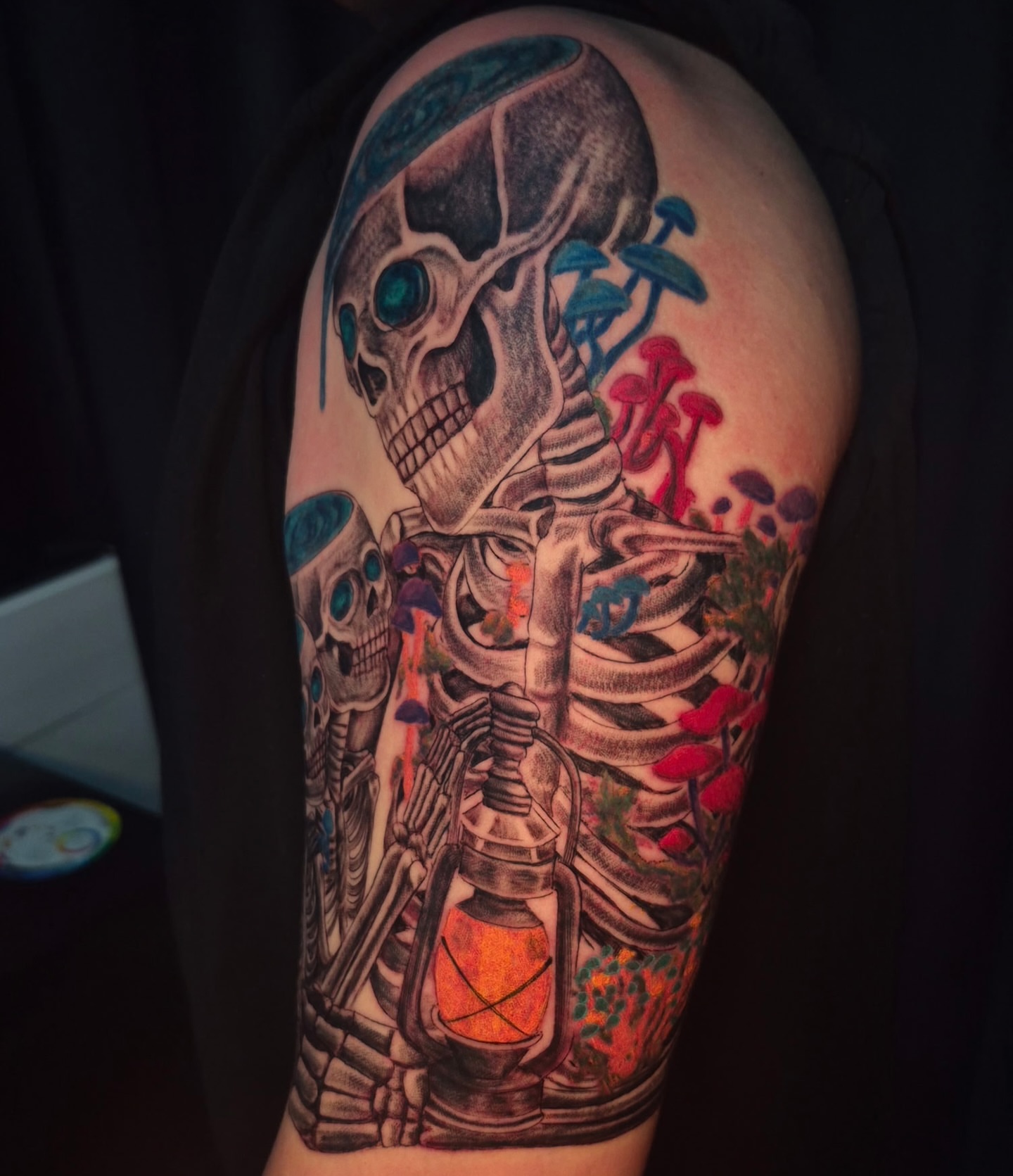 Skeleton with mushrooms realism tattoo on the forearm by Jinx Ryder
